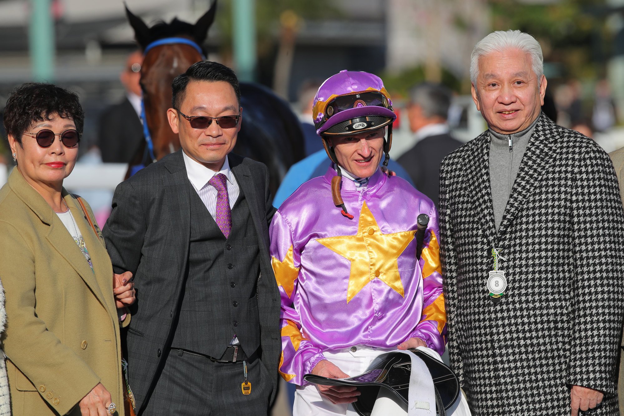 Trainer Jimmy Ting (second from left), jockey Zac Purton and connections of Little Paradise celebrate. Trainer Jimmy Ting (second from left), jockey Zac Purton and connections of Little Paradise celebrate.
