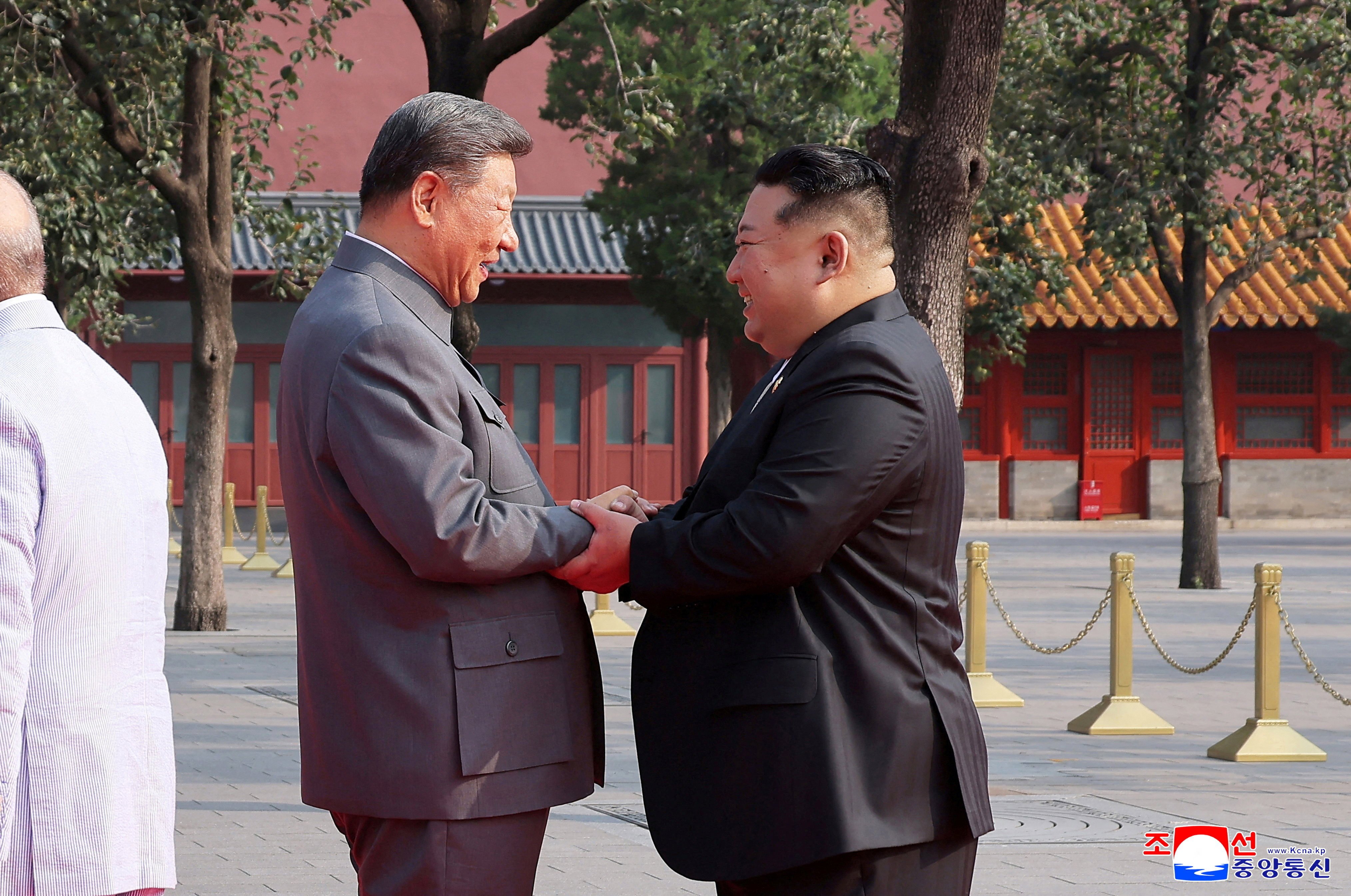 North Korean leader Kim Jong-un shakes hands with Chinese President Xi Jinping as they attend a military parade marking the 80th anniversary of the end of World War II in Beijing, China, in this picture released by the Korean Central News Agency on September 4. Photo: KCNA via Reuters