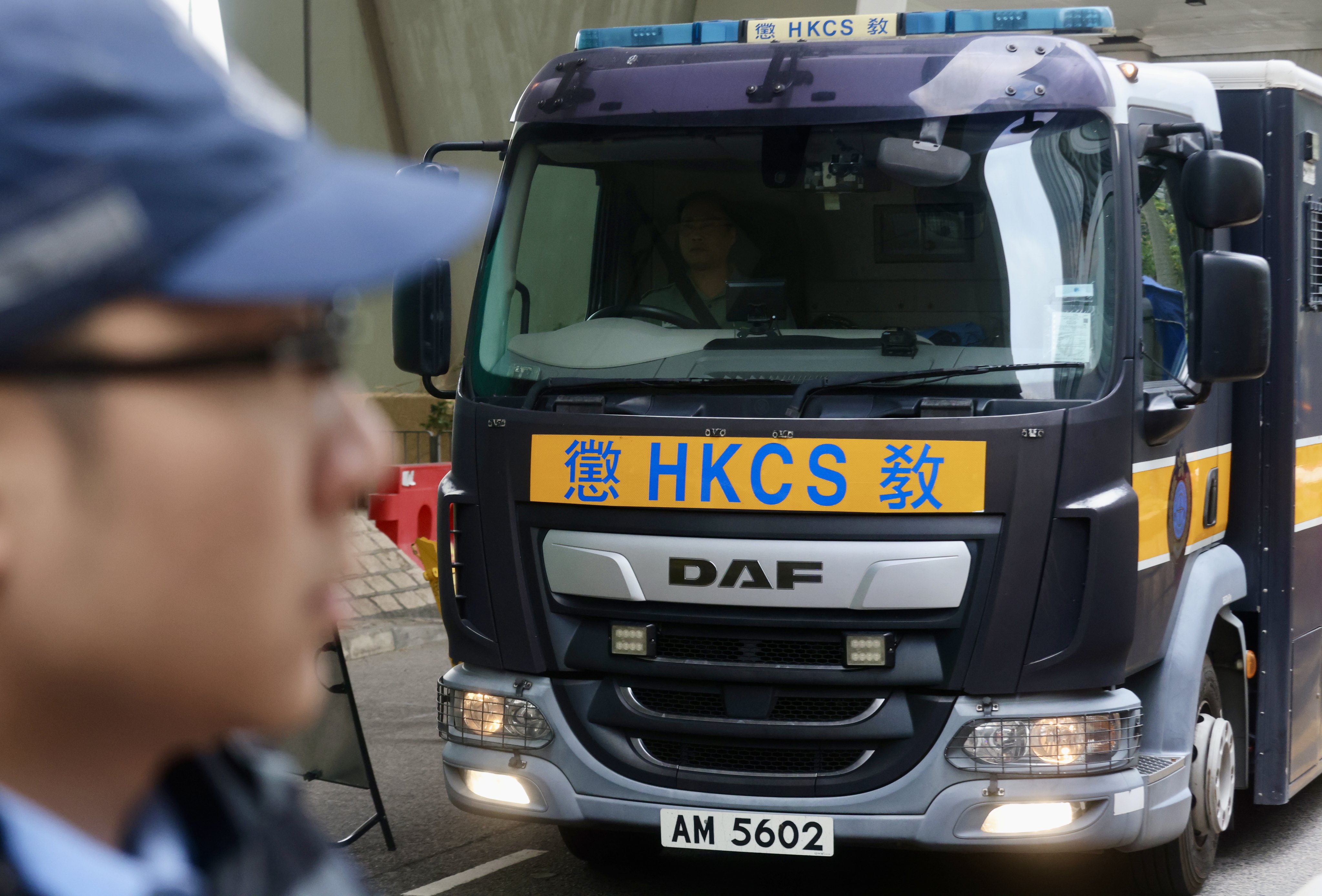 Defendants in Jimmy Lai’s national security trial arrive at court on Monday. Photo: Jonathan Wong