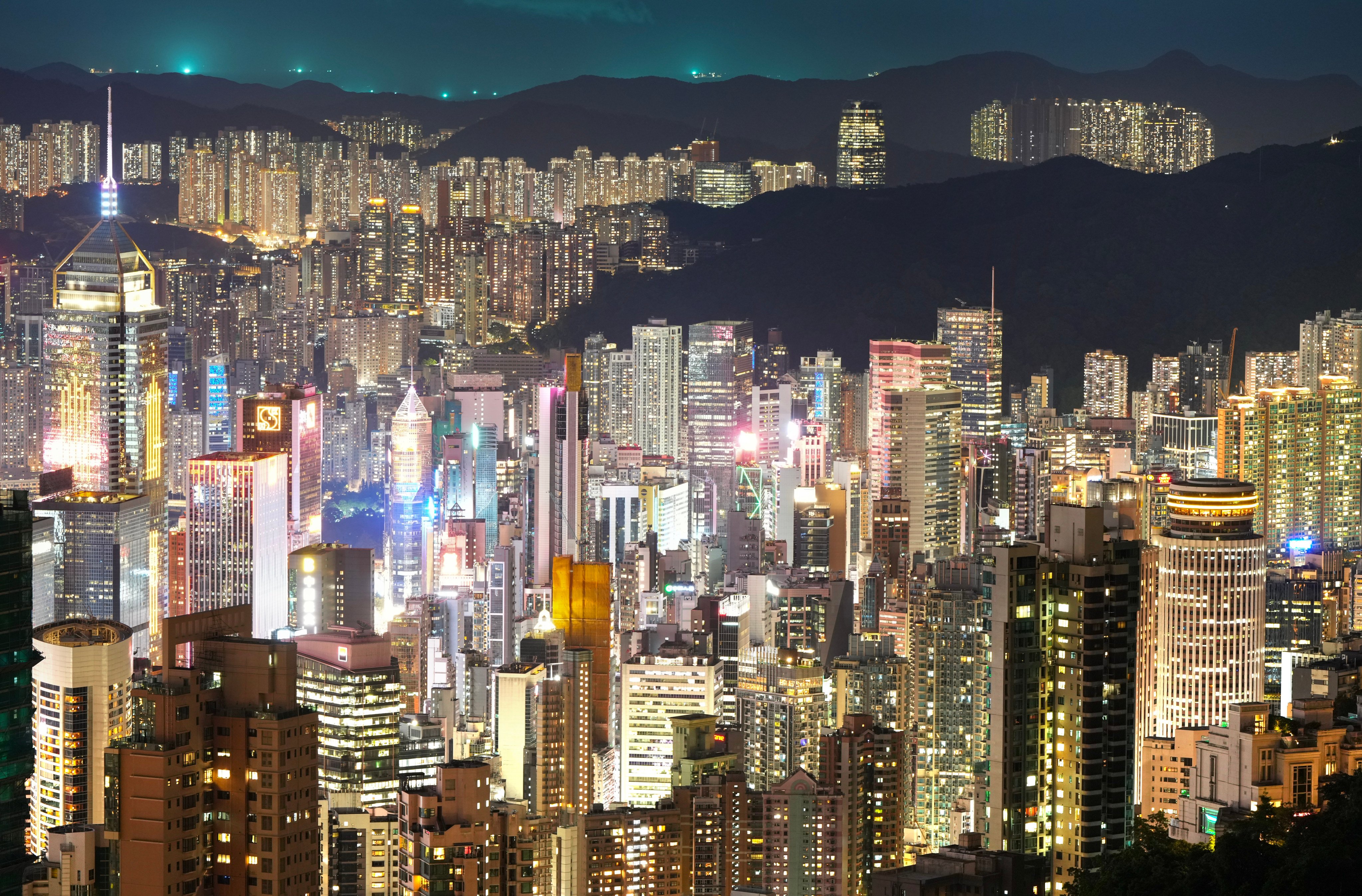 A night view of Hong Kong Island and Kowloon from The Peak. Property prices in the city are expected to trend upwards this year. Photo: Sam Tsang