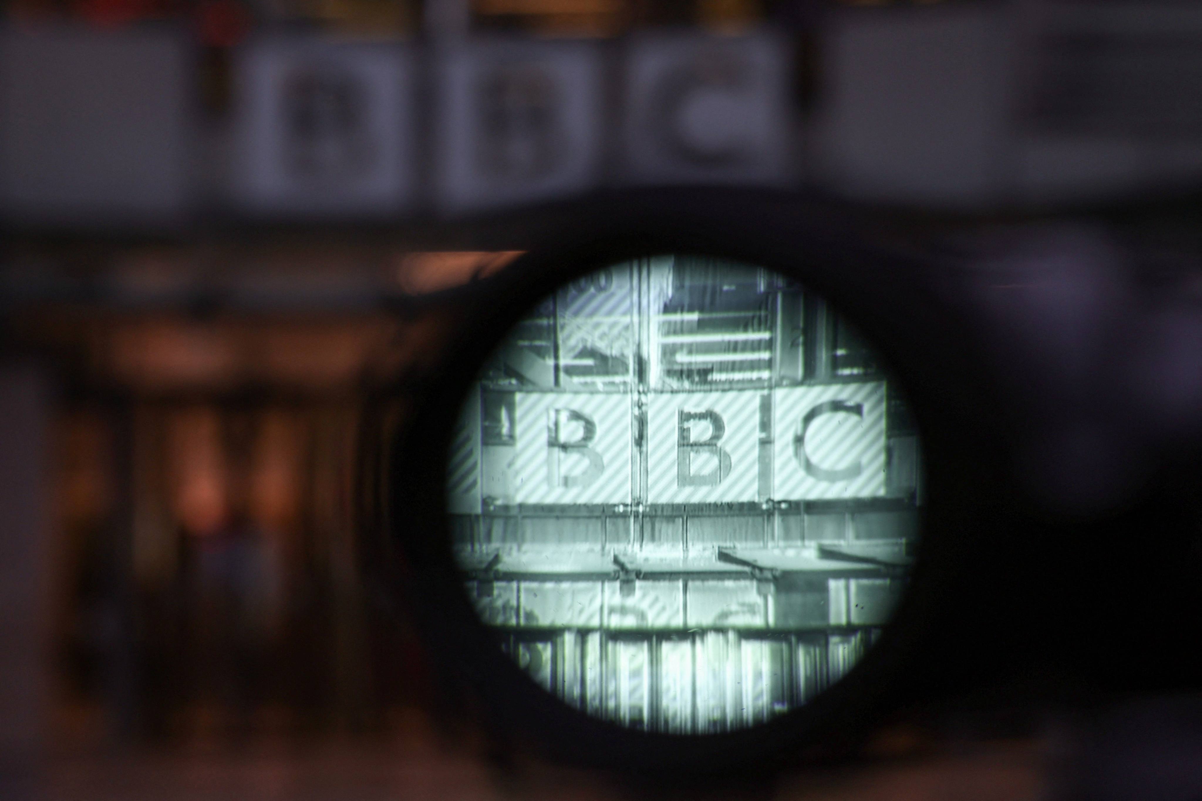 The viewfinder of a camera shows the entrance outside the offices of the BBC in London in November 2025. Photo: AFP