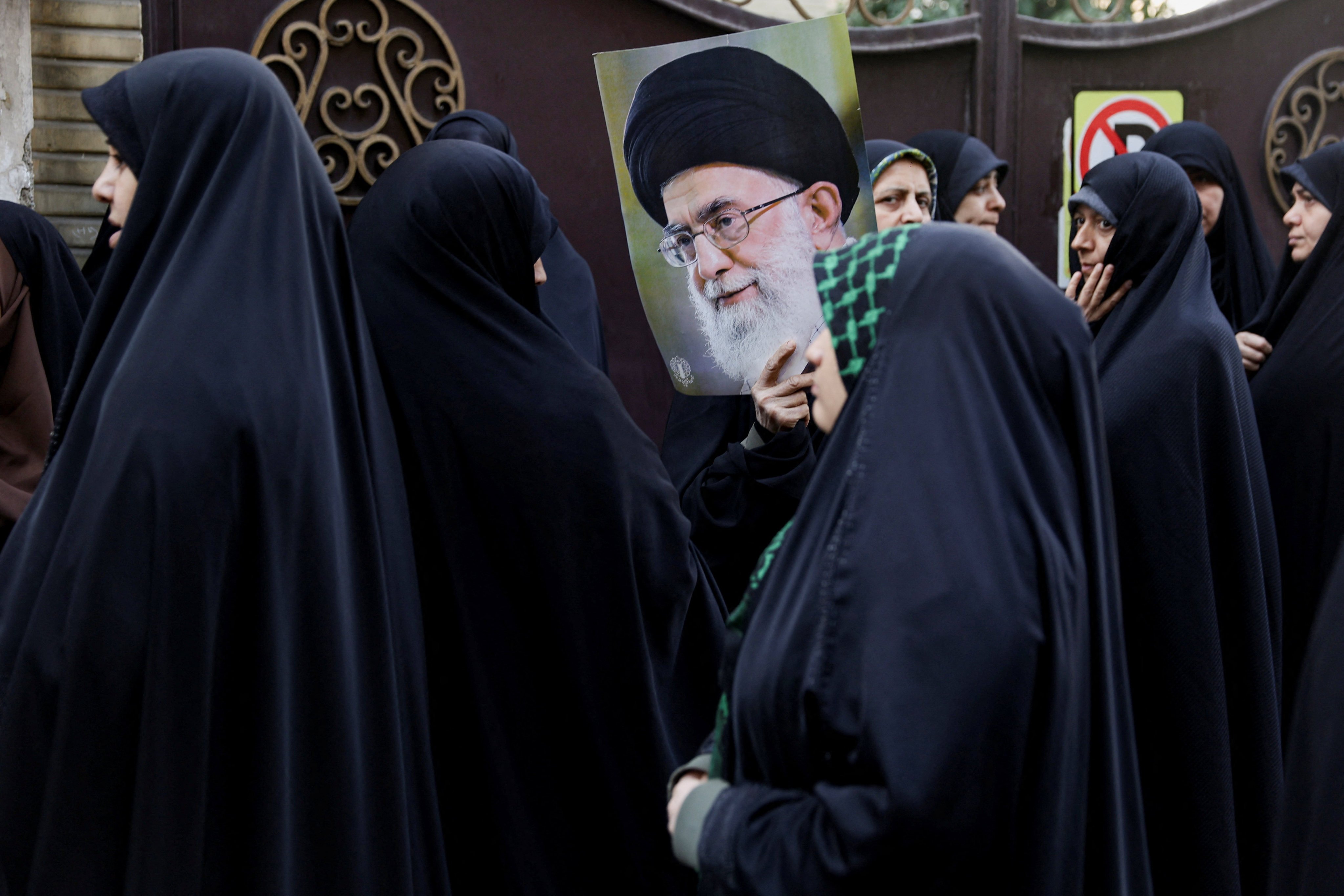 Iranians at a pro-government rally in Tehran on January 12. Photo: West Asia News Agency via Reuters
