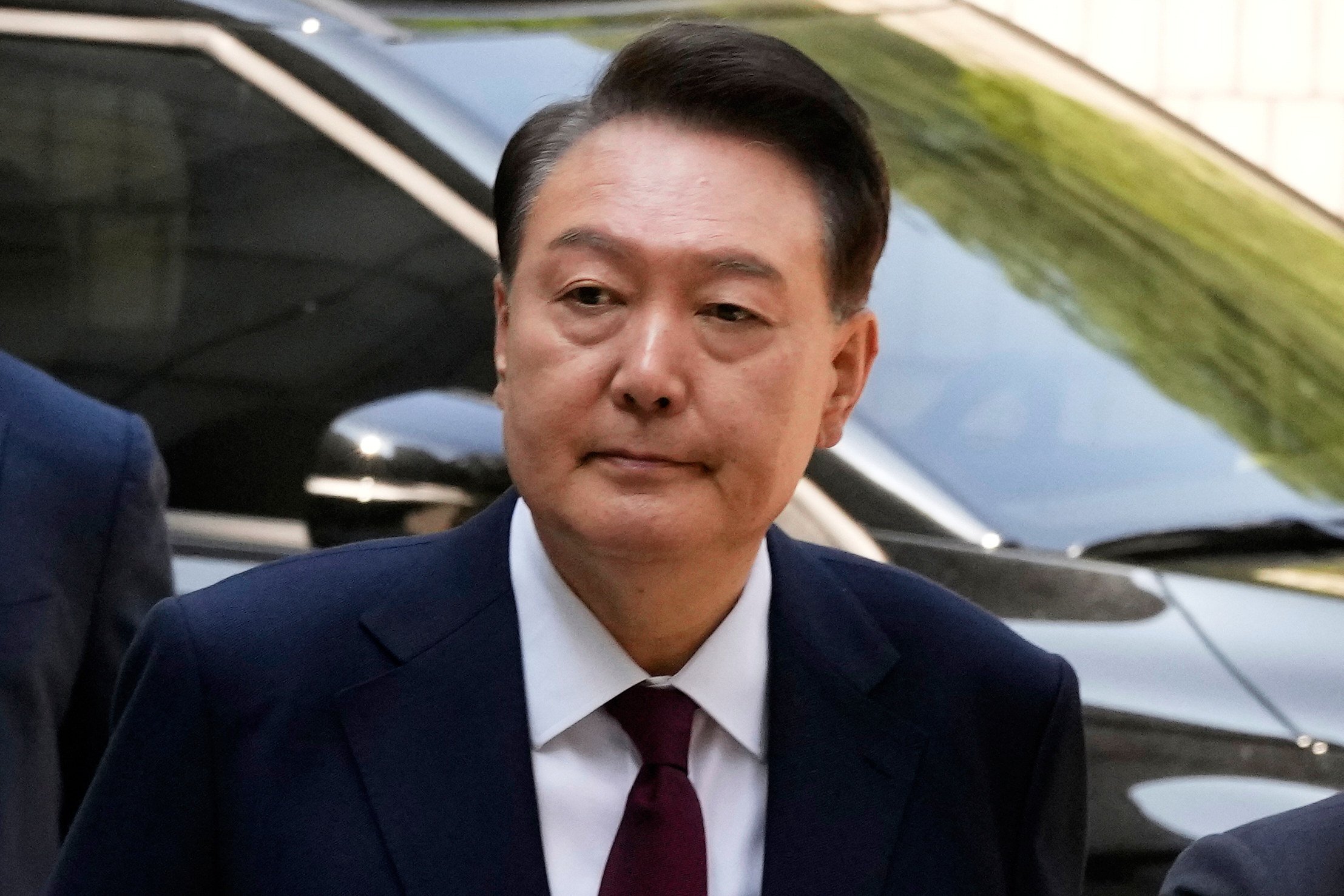 South Korea’s ousted former president Yoon Suk-yeol arrives to attend his trial at Seoul Central District Court in May 2025. Photo: AP