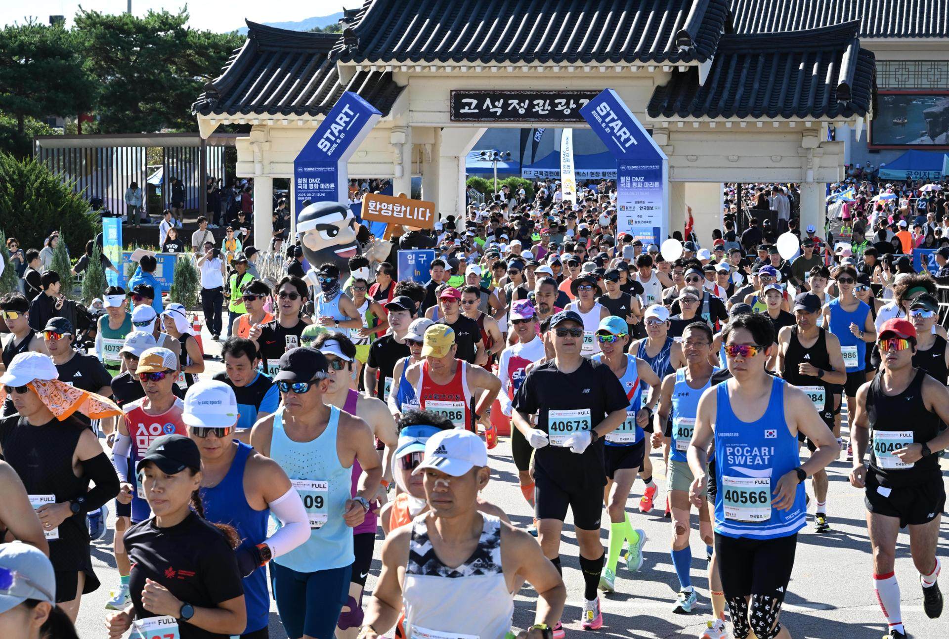 Runners set off during the DMZ International Peace Marathon, in the Demilitarized Zone in Gangwon province, in South Korea, on September 21, 2025. Some 10 million South Koreans now identify as runners, according to industry and tourism data, roughly double the figure from 2015. Photo: The Korea Times