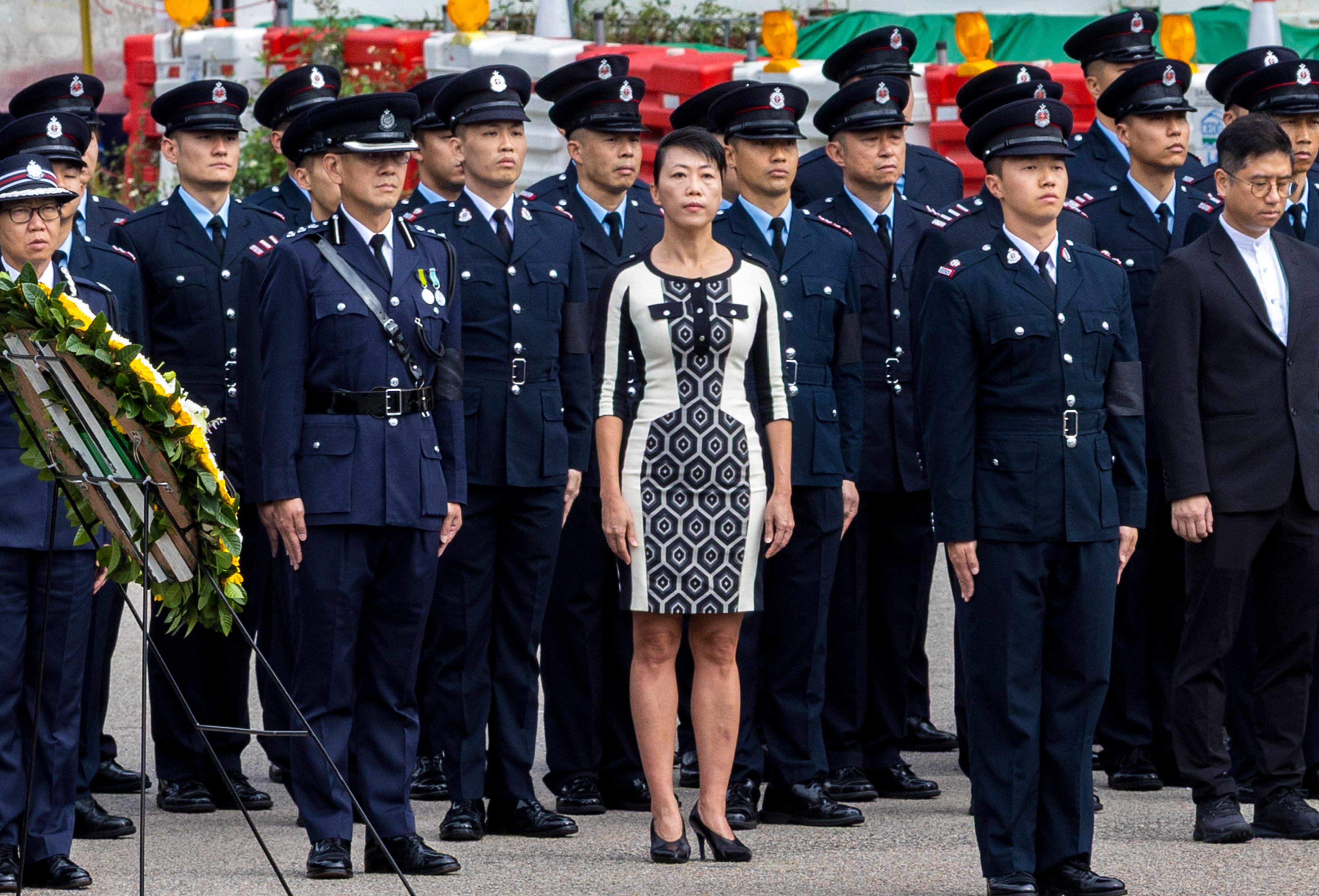 Tai Po district officer Eunice Chan at the funeral of firefighter Ho Wai-ho last month. Photo: Dickson Lee