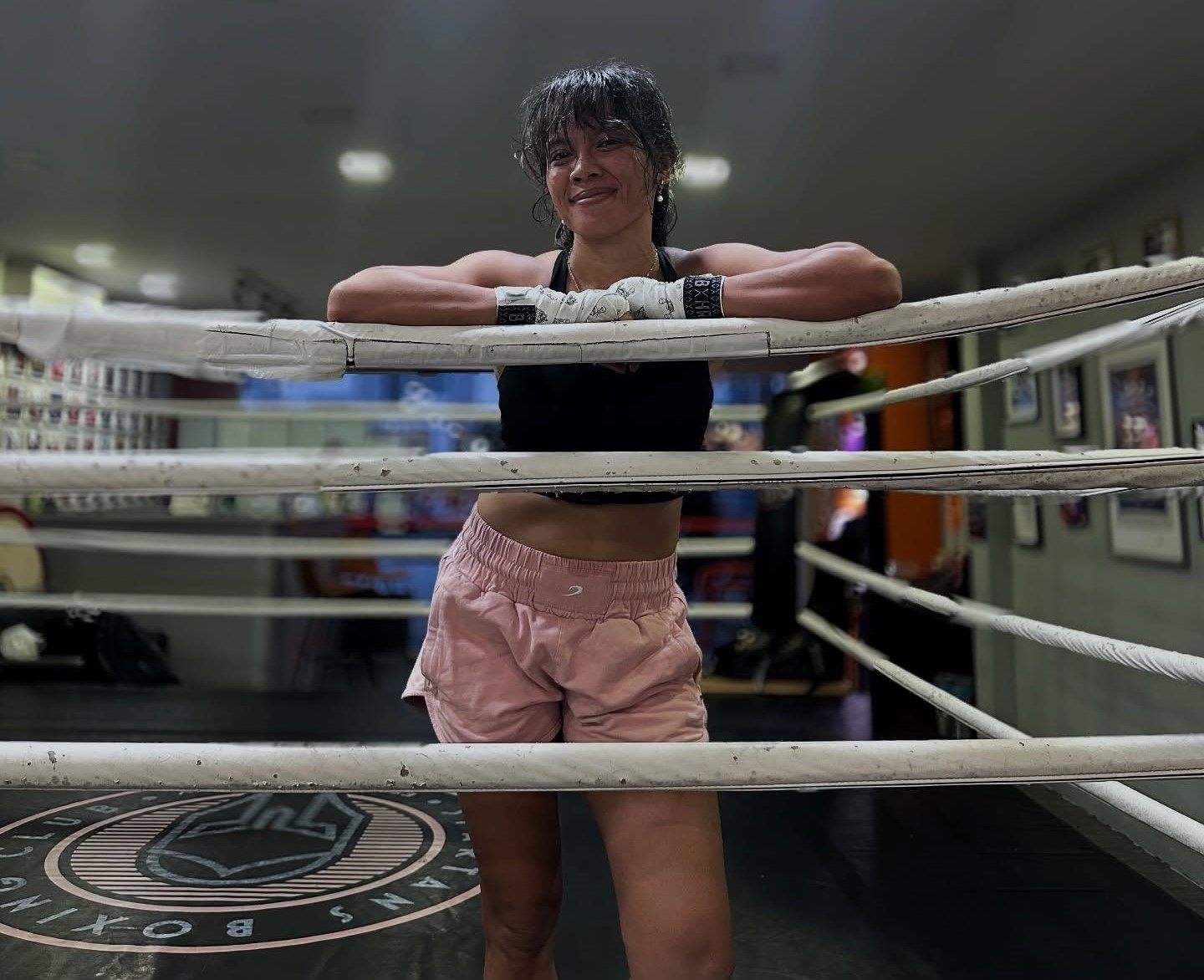 Efasha Kamarudin, known professionally as The Face, poses inside the ring at the Spartans Boxing Club in Singapore, where she trains. 
Photo: Instagram/fash_theface