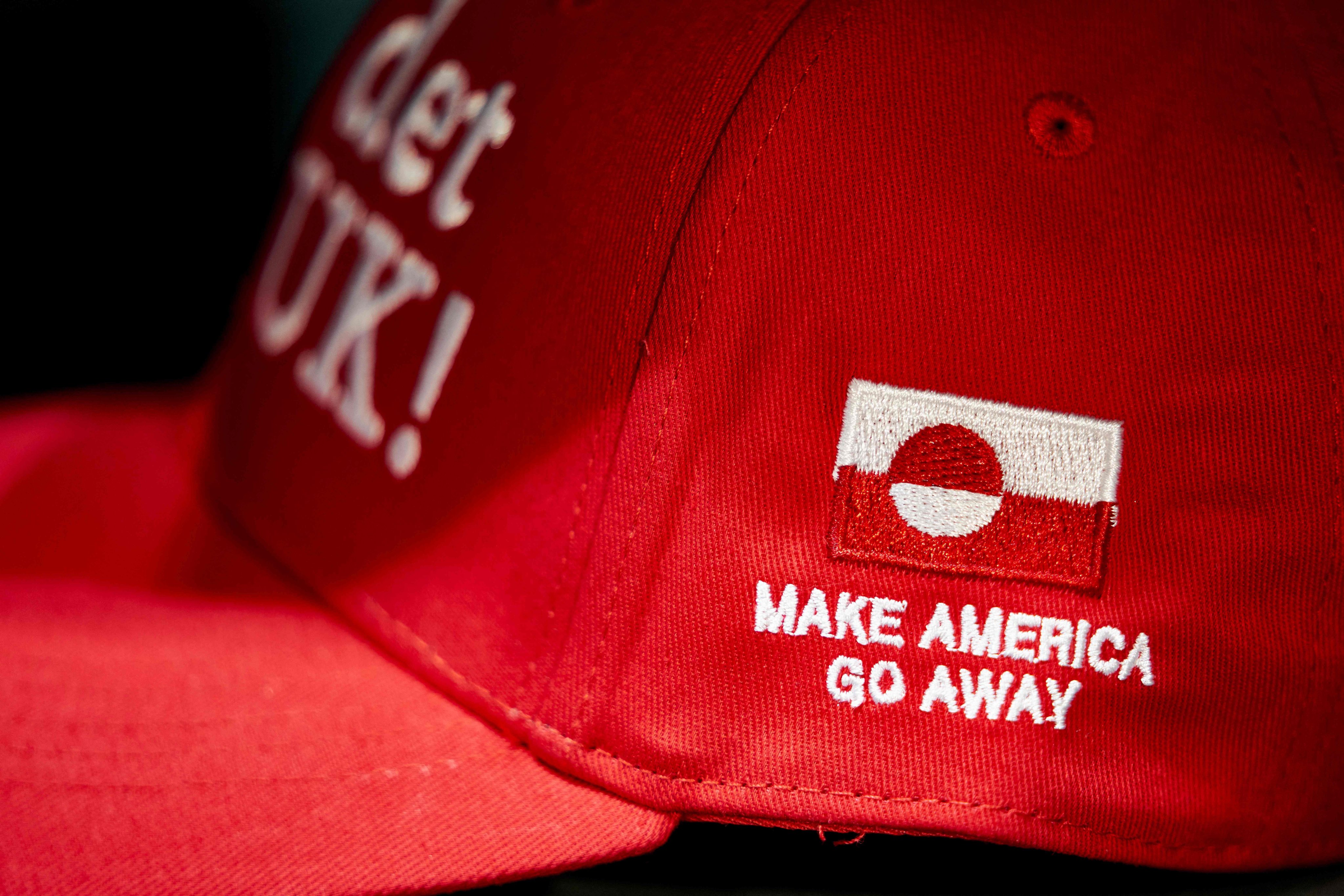 A “Nu det NUUK!” cap with a “Make America Go Away” slogan is displayed in a clothing store in Copenhagen on Monday. Photo: AFP