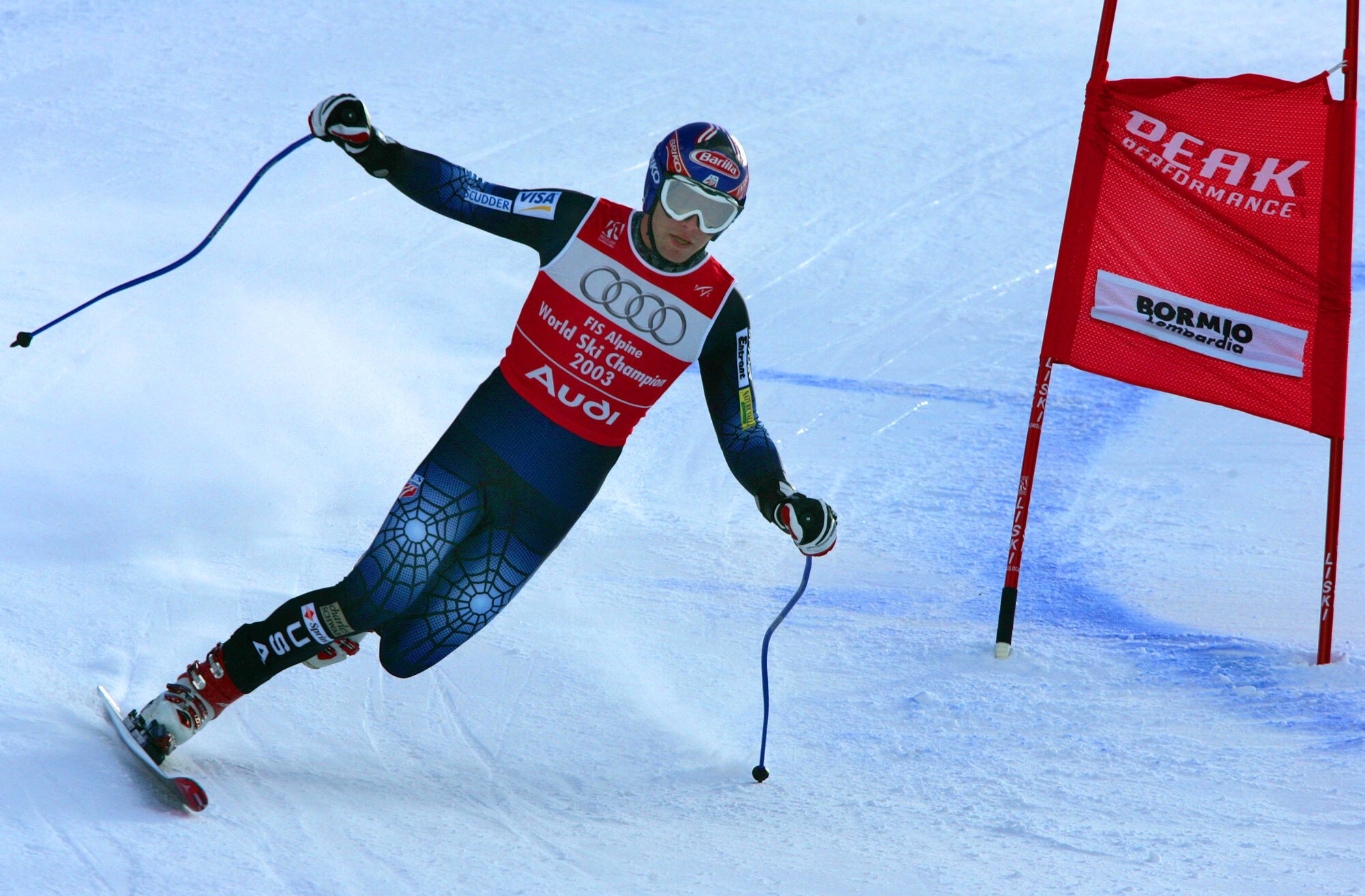 Bode Miller of the United States makes a turn on one ski during the Men’s Combined at the World Alpine Ski Championships in Bormio, Italy in February 2005. Photo: AP