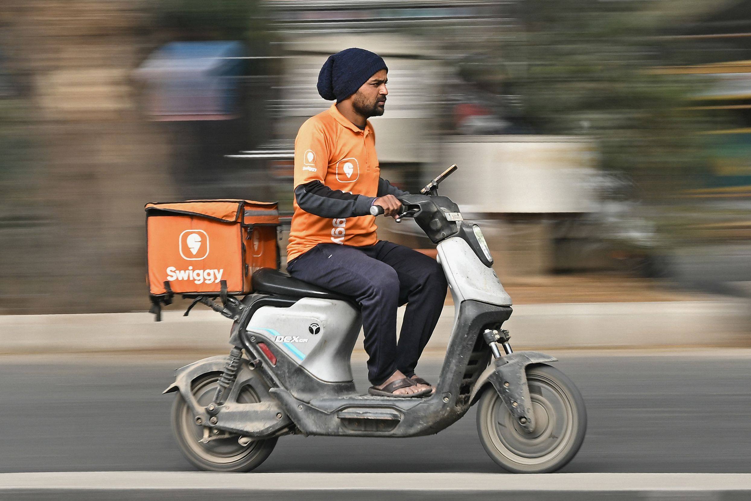 The Indian government has urged quick commerce firms to drop their 10-minute delivery promises amid safety concerns for gig workers. Photo: AFP