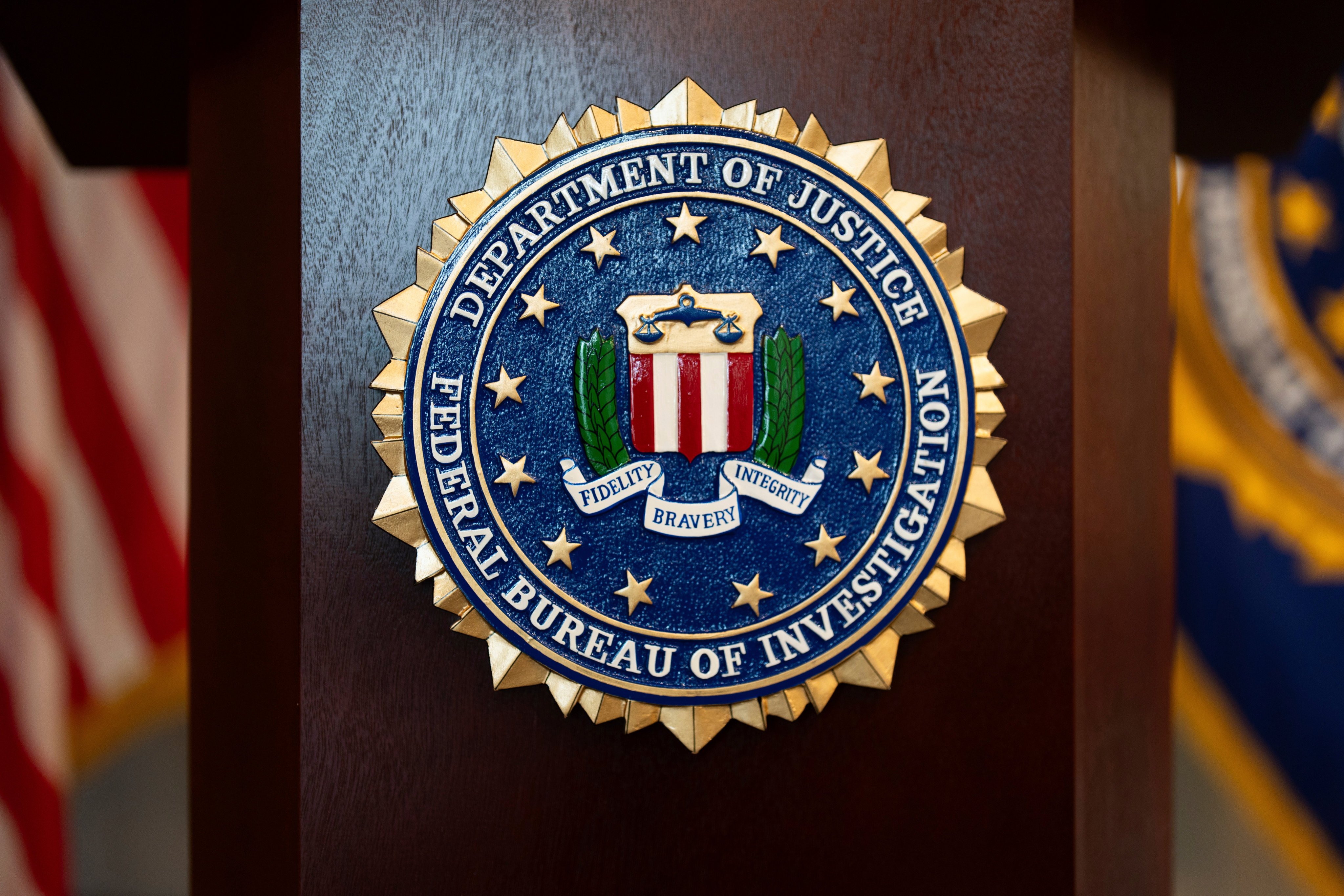 An FBI seal is displayed on a podium before a news conference at the field office in Portland, Oregon, in January 2025. Photo: AP