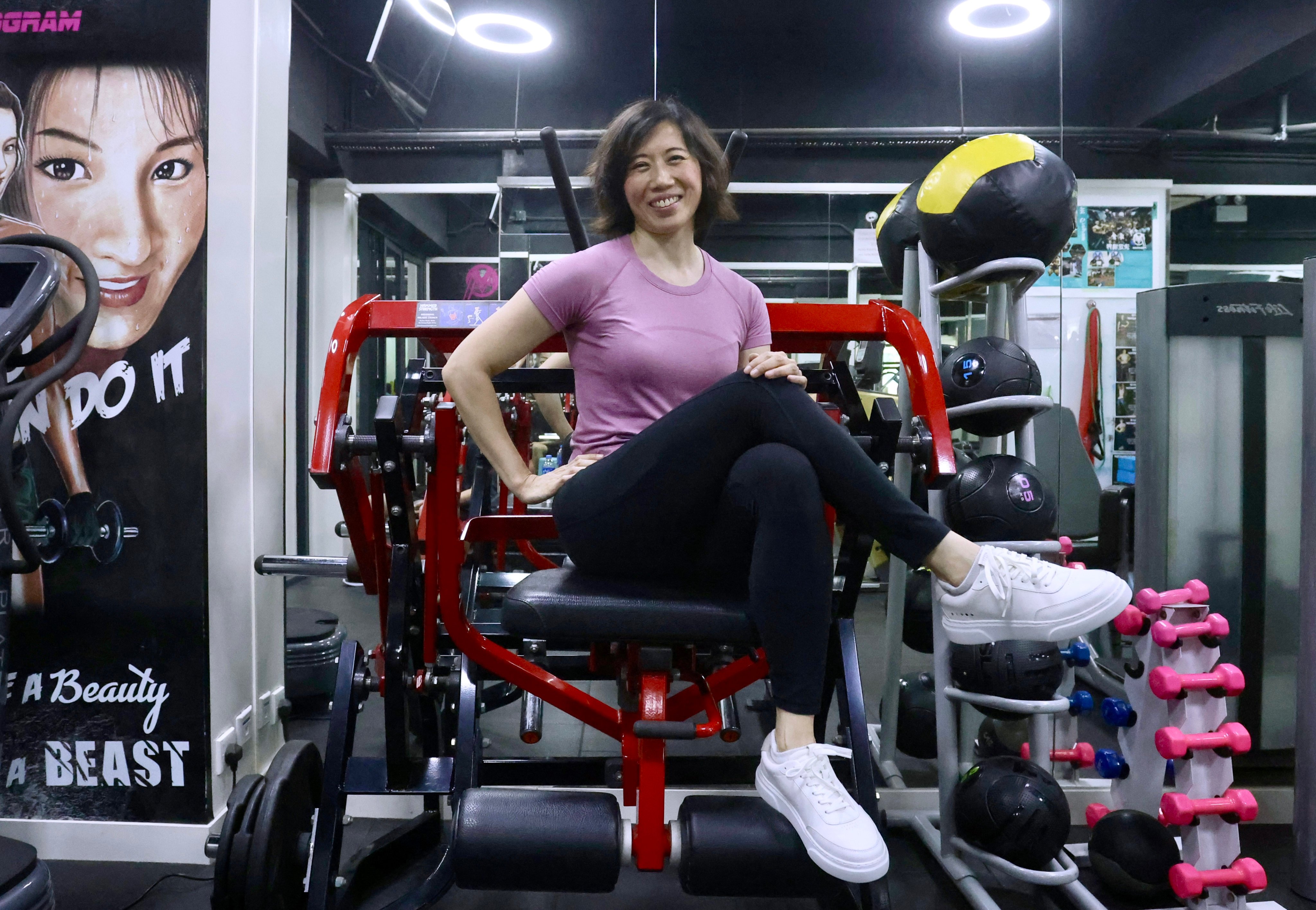 Karen Chau, who is from Taiwan but has called Hong Kong home for the last decade, is pictured at a gym in the city’s Tin Hau neighbourhood. After losing 13kg in four months, she set up her charity Fit2Give to help church ministers and NGO workers on their fitness journey. Photo: Jonathan Wong