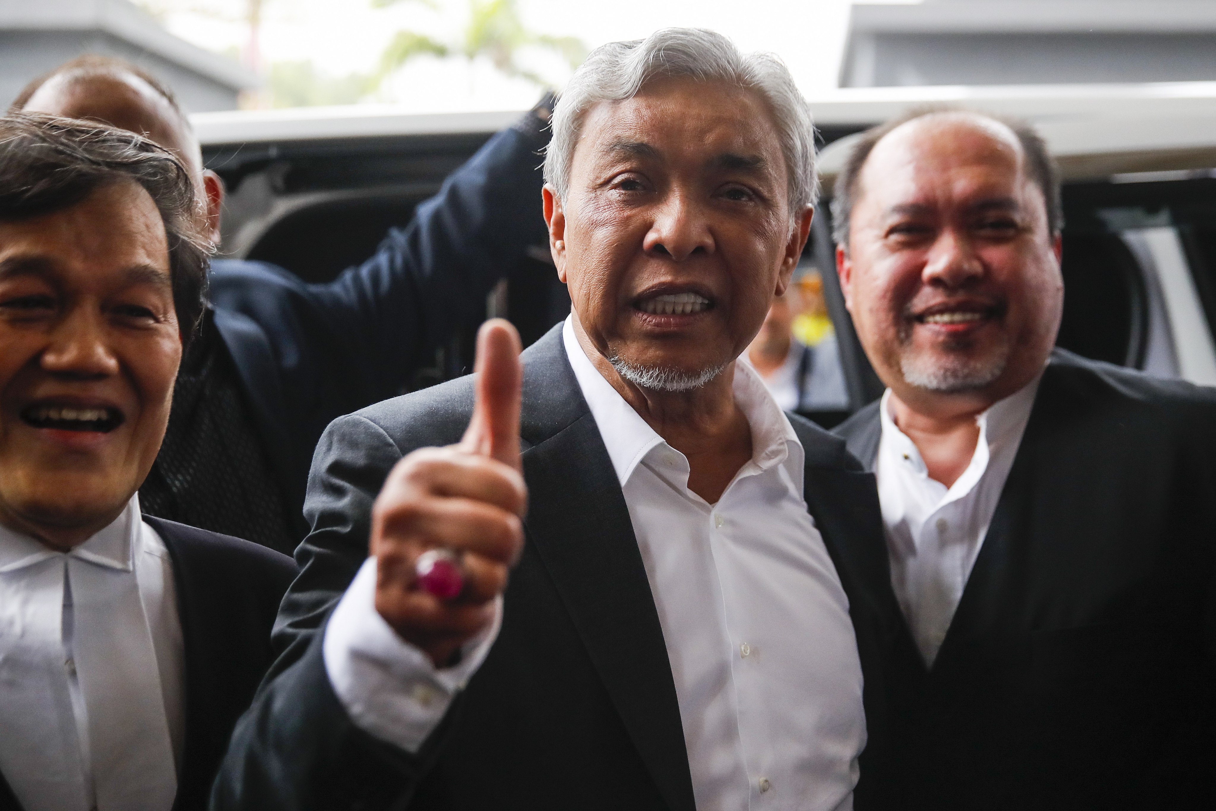 Umno President Ahmad Zahid Hamidi reacts after being acquitted of corruption on September 4, 2023. Photo: EPA-EFE