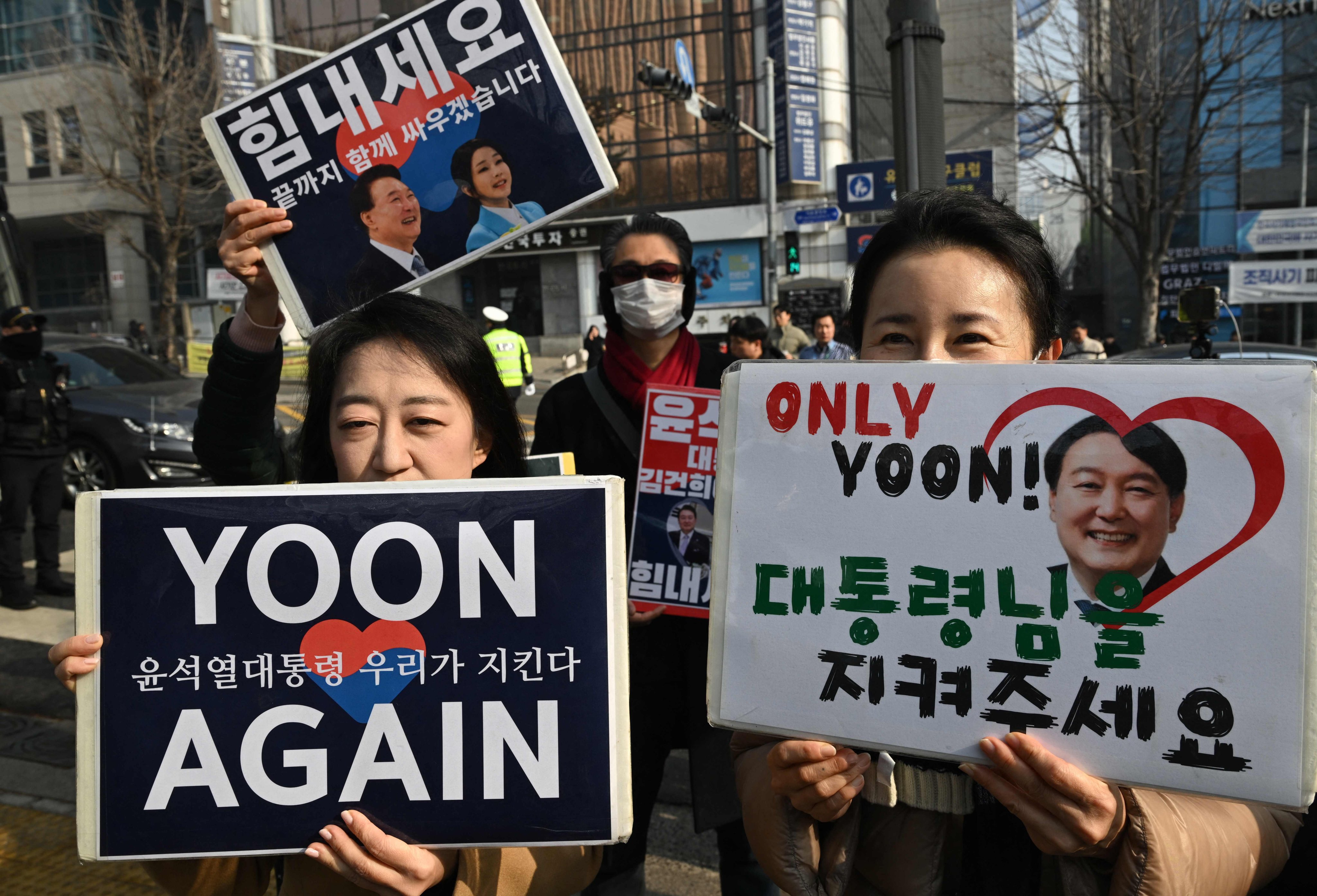 Supporters of South Korea’s former president Yoon Suk-yeol gather in front of the Seoul Central District Court on Friday. Photo: AFP