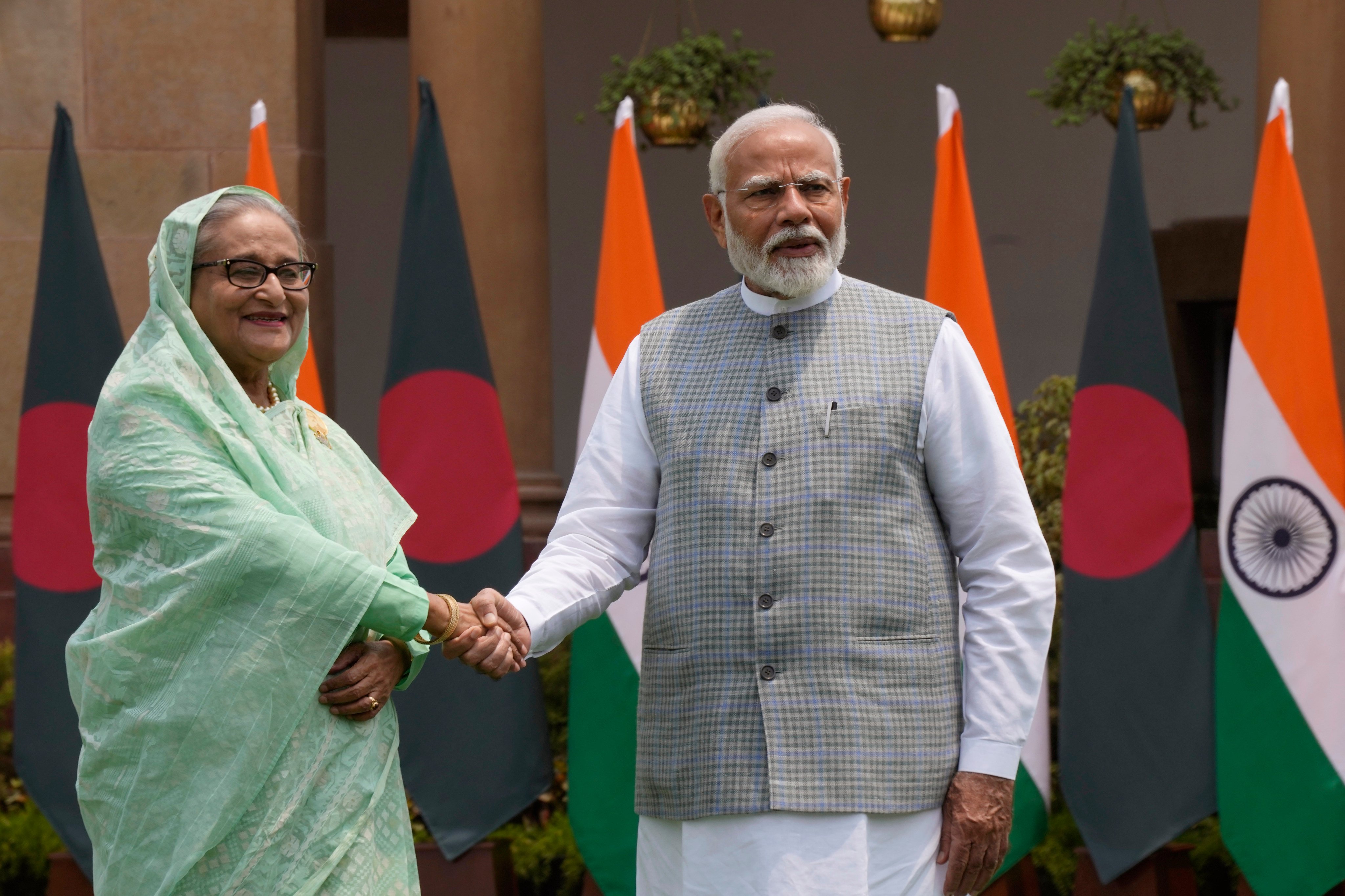 Indian Prime Minister Narendra Modi meets then Bangladeshi leader Sheikh Hasina before a meeting in New Delhi on June 22, 2024. Photo: AP