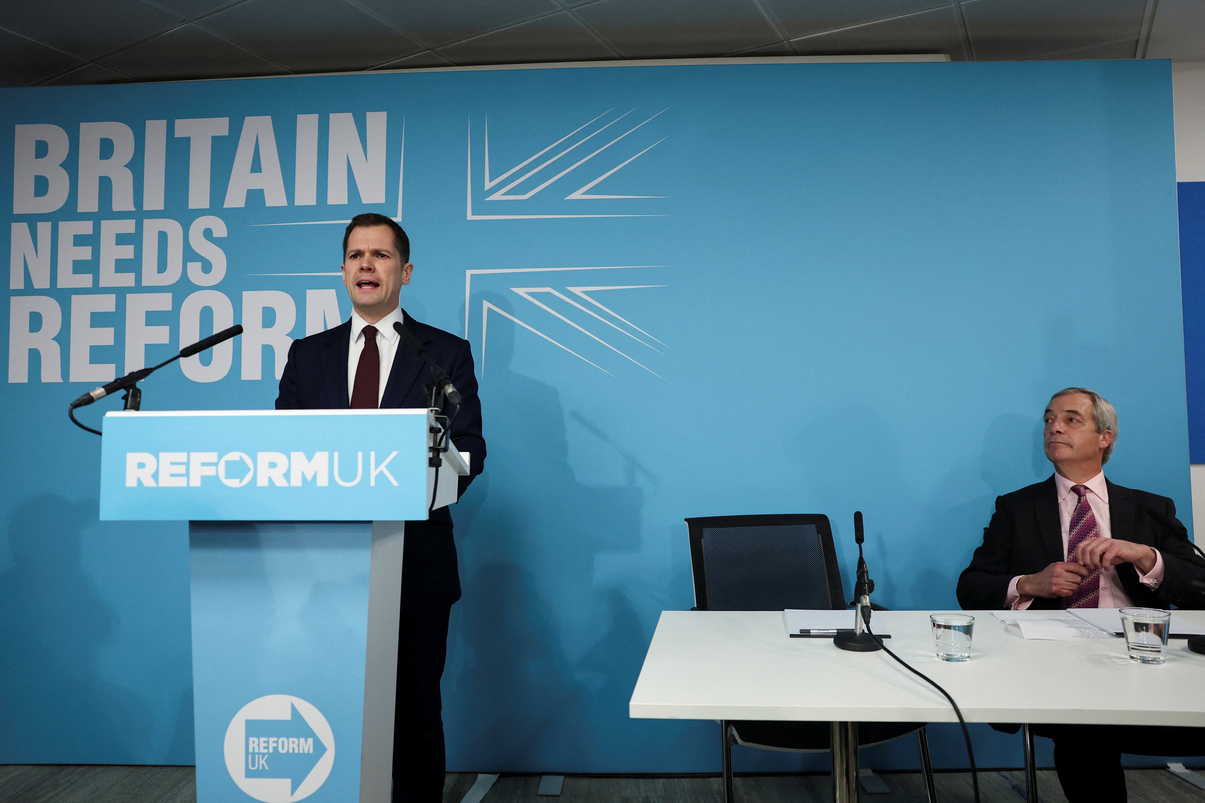 Robert Jenrick, left, a former British Conservative Party member, at a press conference with Reform UK leader Nigel Farage in London on Thursday. Photo: Reuters