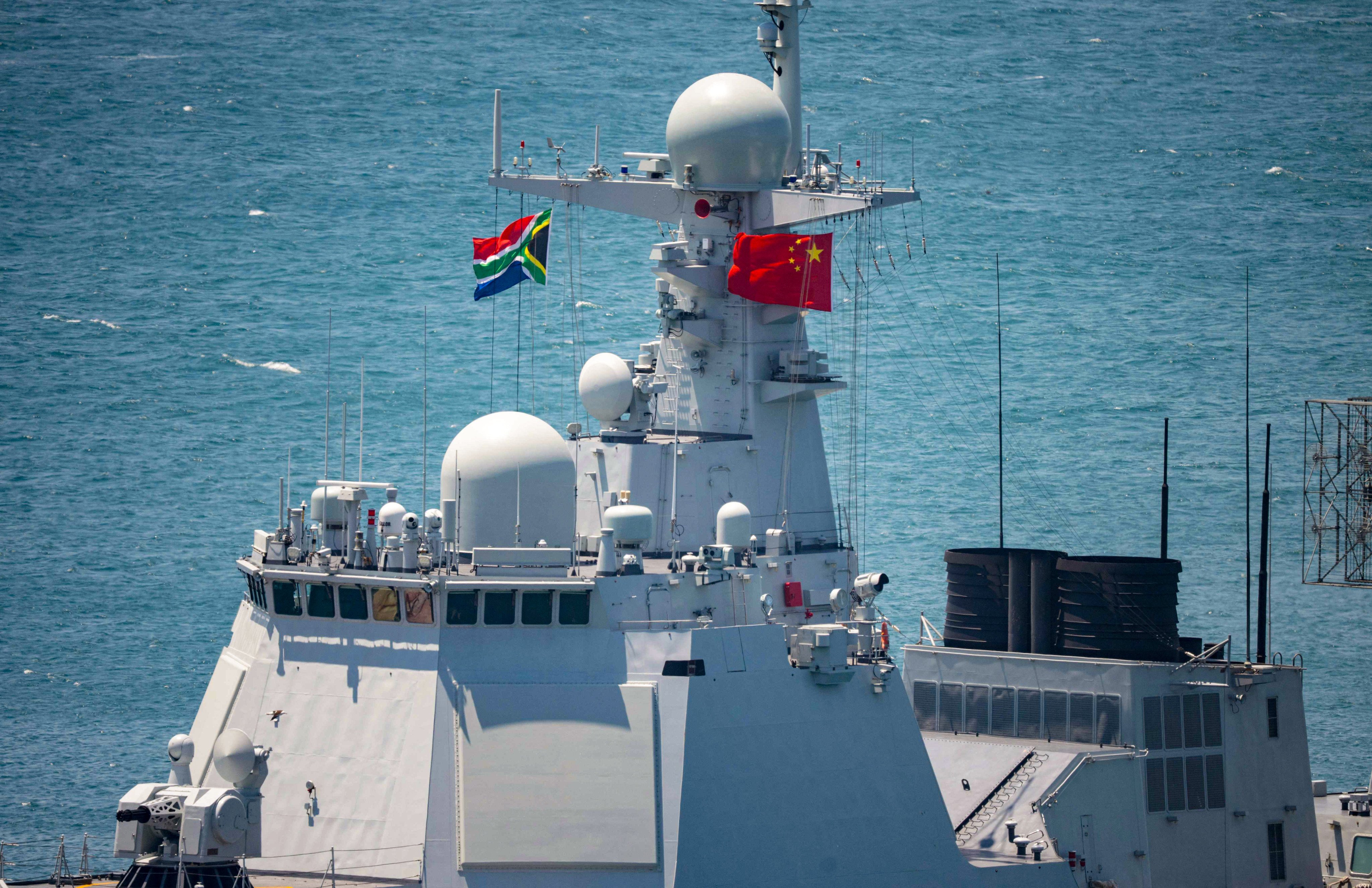 South African and Chinese flags fly aboard the Chinese guided-missile destroyer Tangshan, moored at port in Cape Town for joint naval drills involving Brics members, on January 10. Photo: AFP