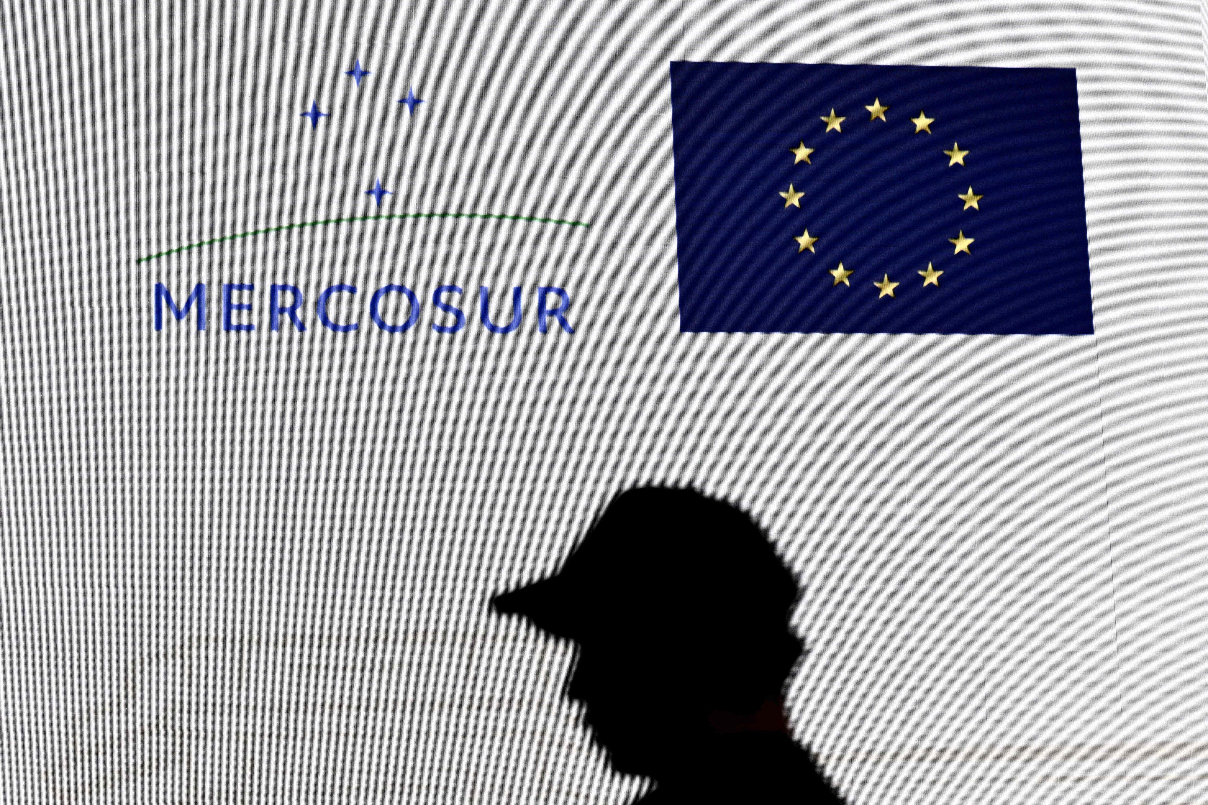 A worker sets up the stage for the signing ceremony of the agreement between the European Union and Mercosur in Paraguay’s central bank in Asuncion on Friday. Photo: AFP
