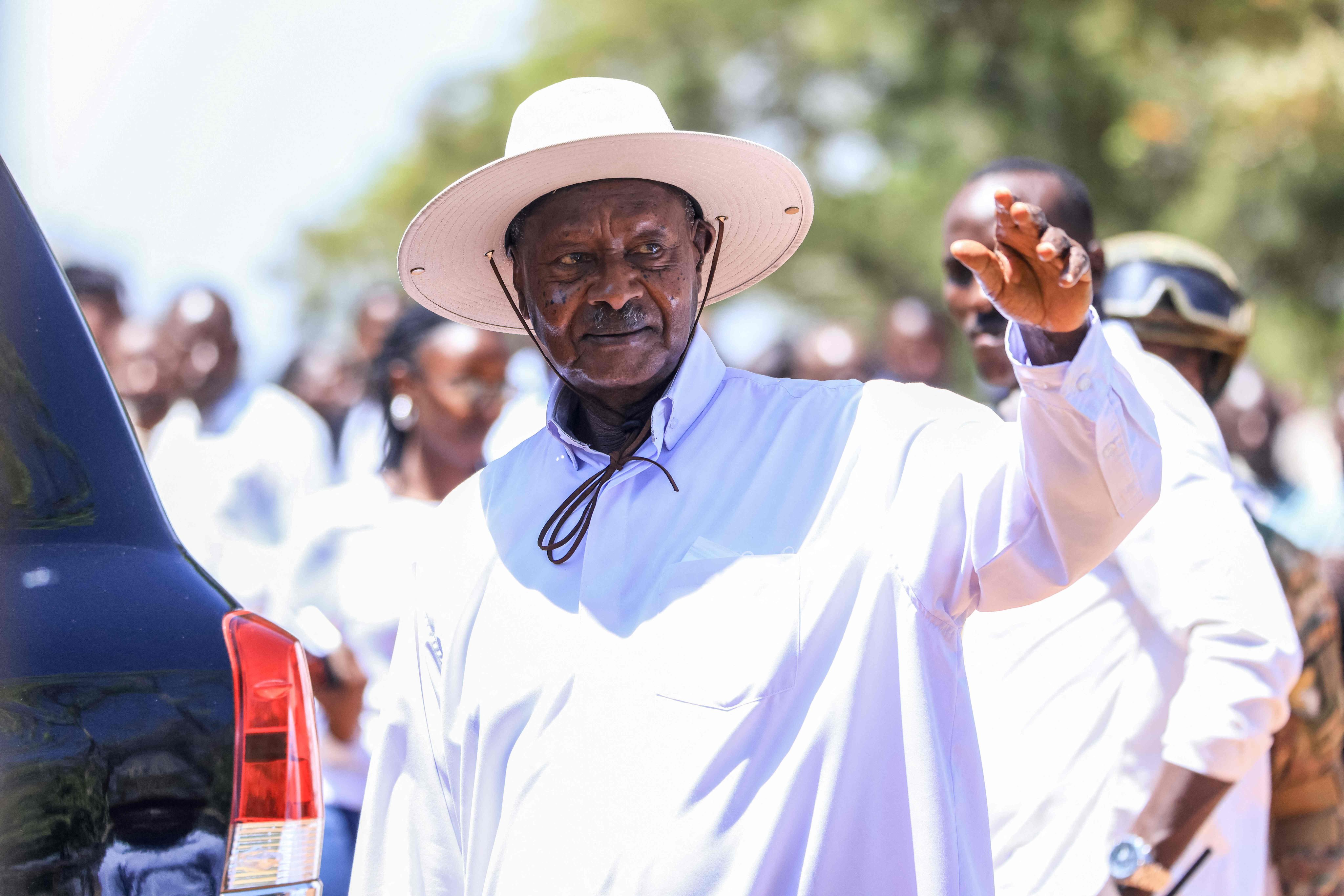 Uganda’s President Yoweri Museveni leaves after casting his ballot in Rwakitura on Thursday. Photo: AFP