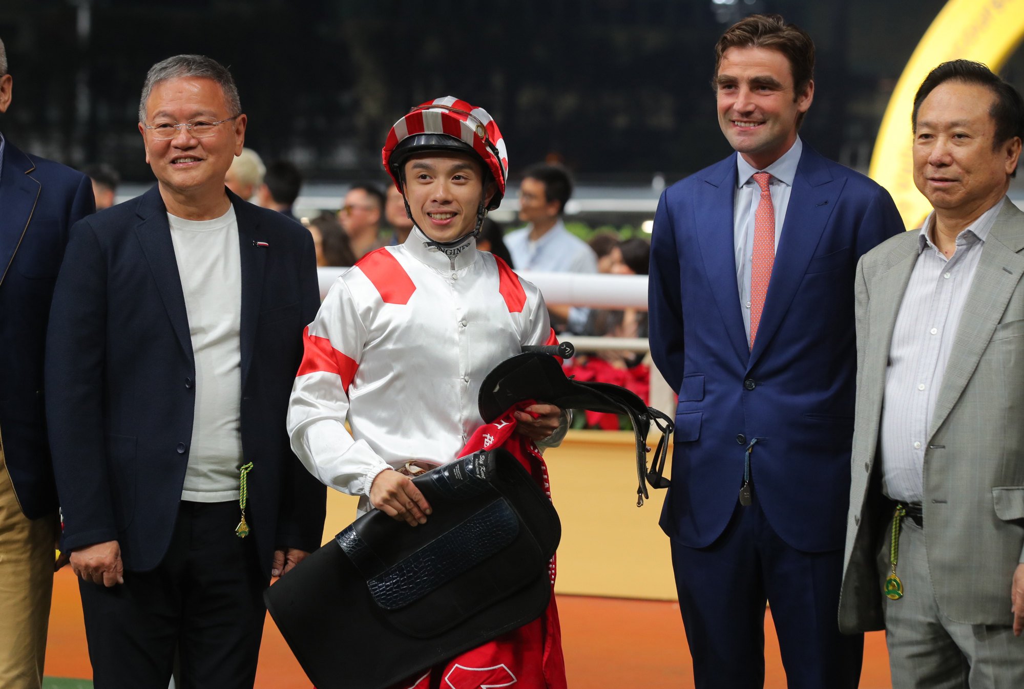 David Eustace (third from right) and owner Bon Ho (far right) celebrate Sports Legend’s recent victory.