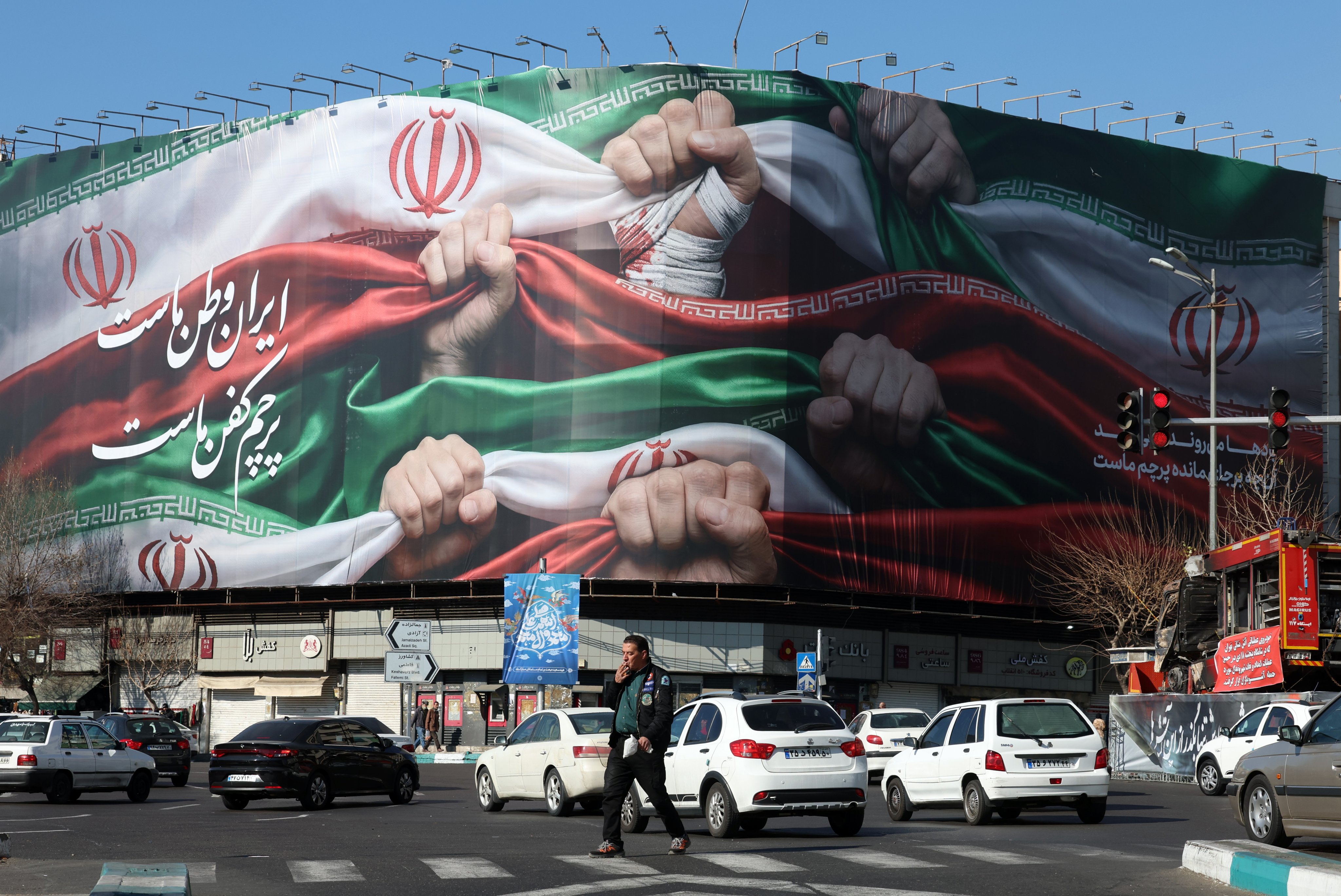 “Iran is our Homeland”, reads a billboard in Persian at a shop in Tehran. Photo: EPA-EFE