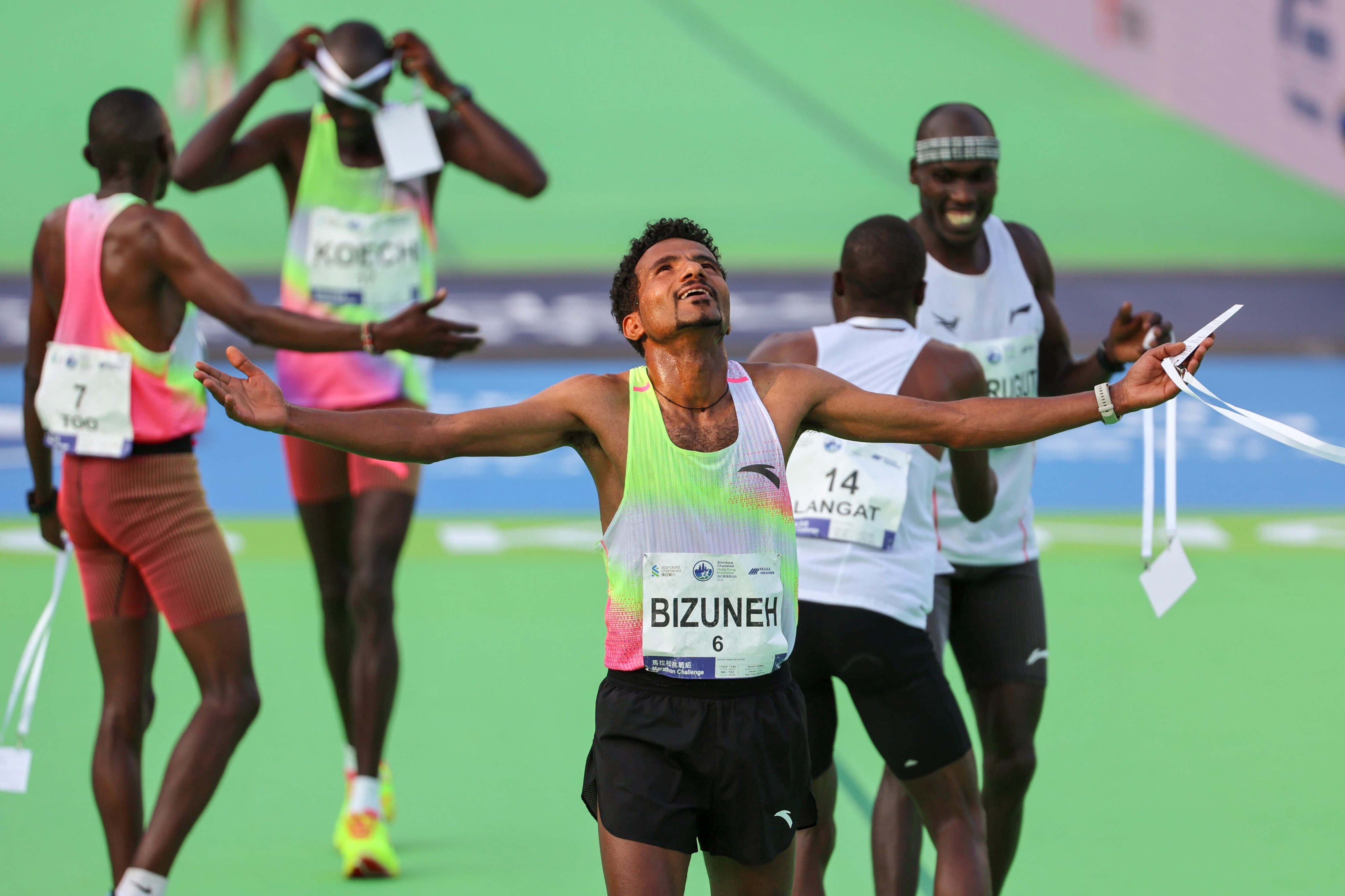 Melaku Belachew celebrates after winning the Standard Chartered Hong Kong Marathon. Photo: Dickson Lee