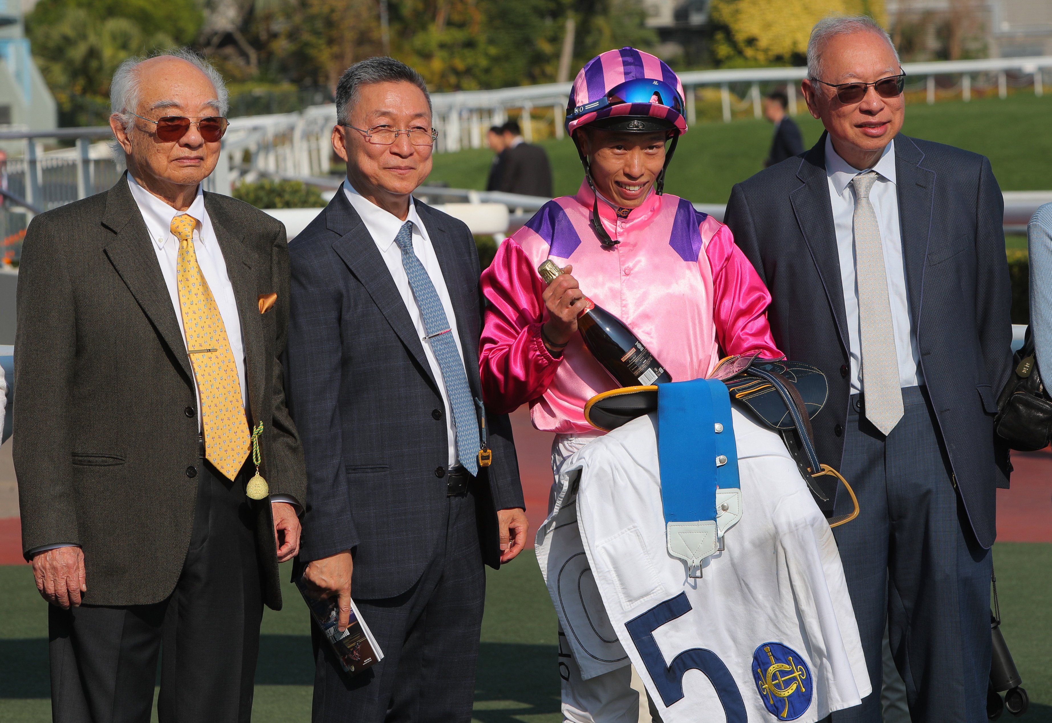 Trainer Francis Lui (second from left), jockey Vincent Ho and connections of Amazing Partners celebrate his Sha Tin victory. Photos: Kenneth Chan