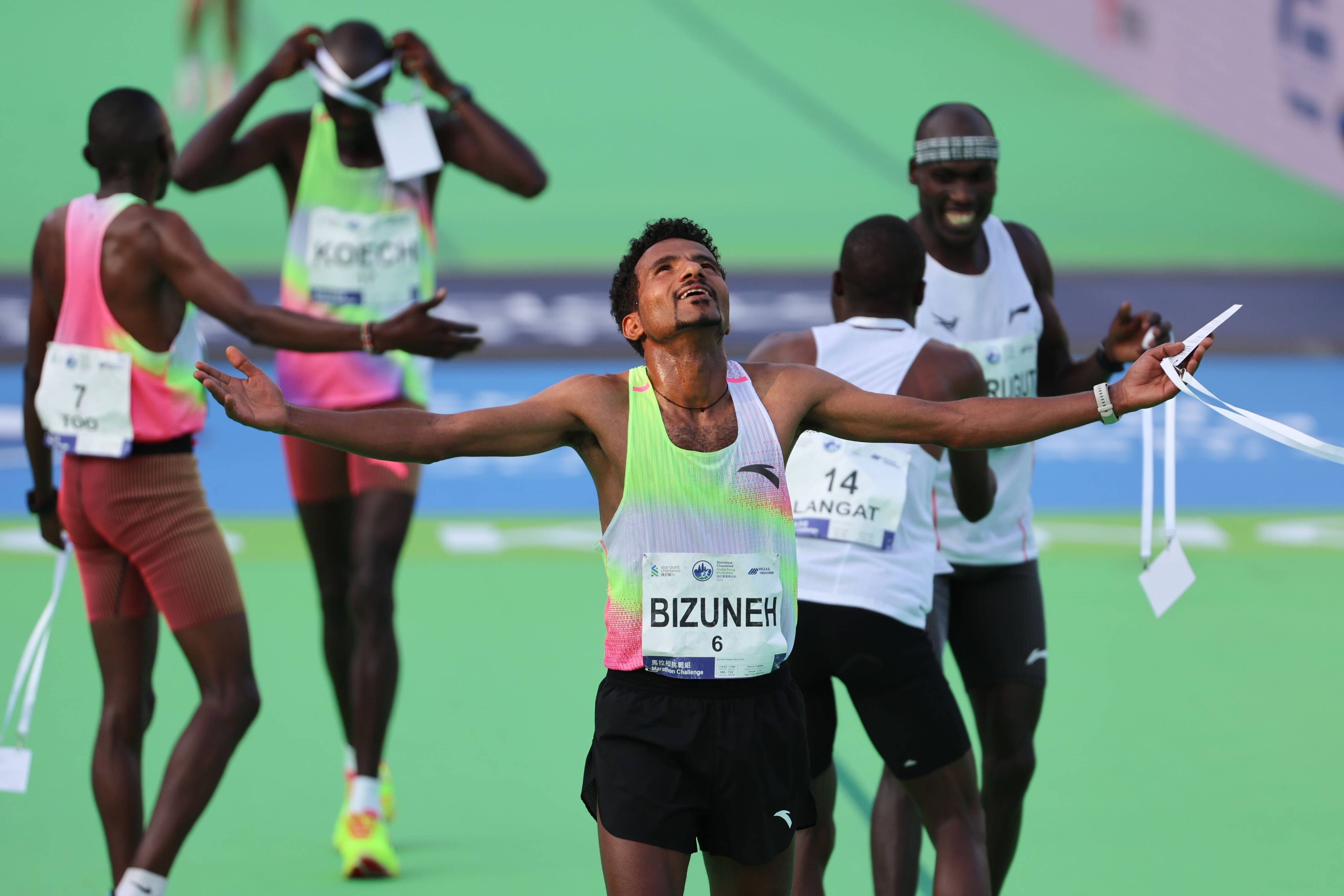 Melaku Belachew celebrates after winning the Standard Chartered Hong Kong Marathon. Photo: Dickson Lee
