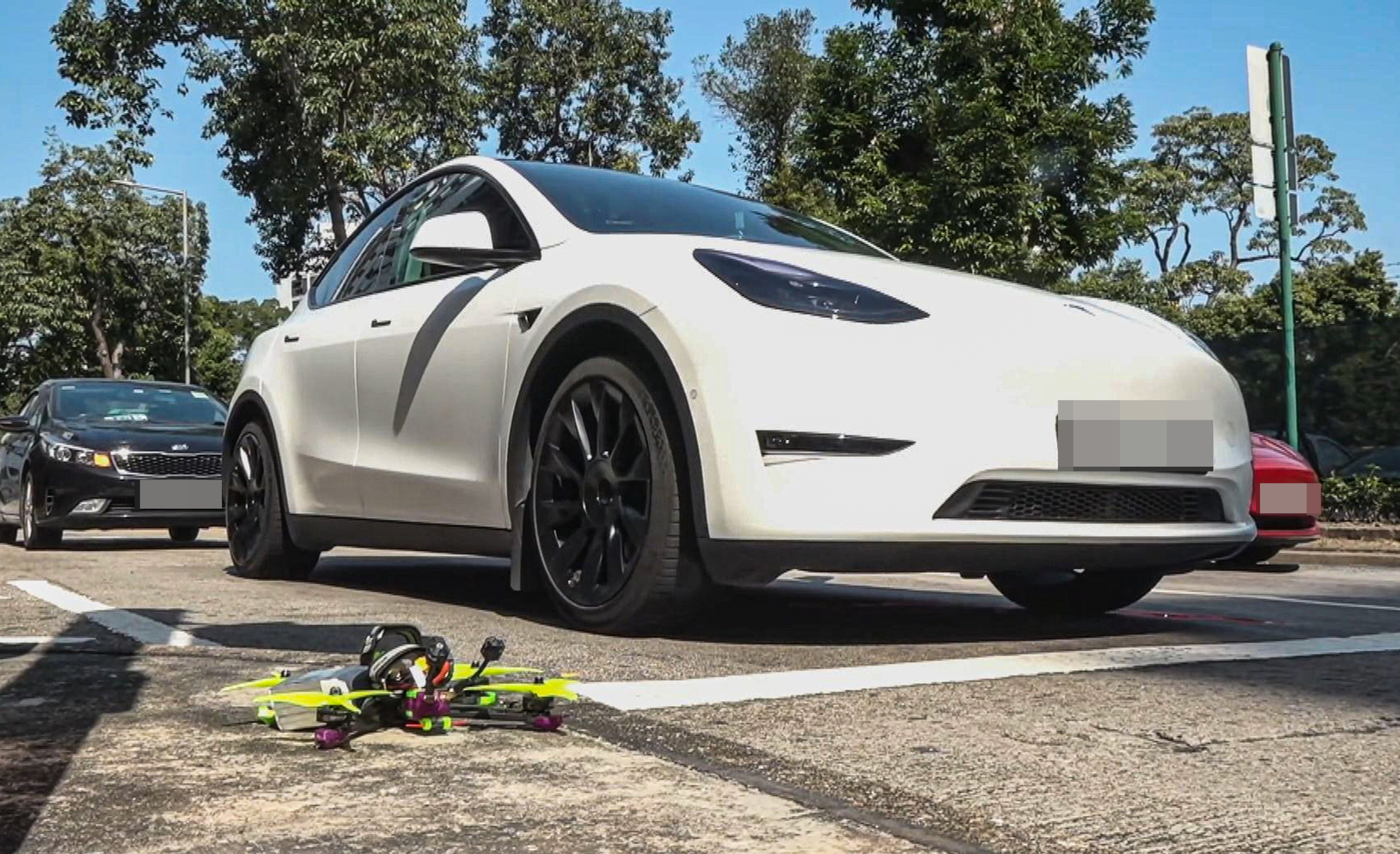 The driver said he was waiting at a red light along Cox’s Road in Jordan when the drone suddenly struck the roof of his car. Photo: Handout