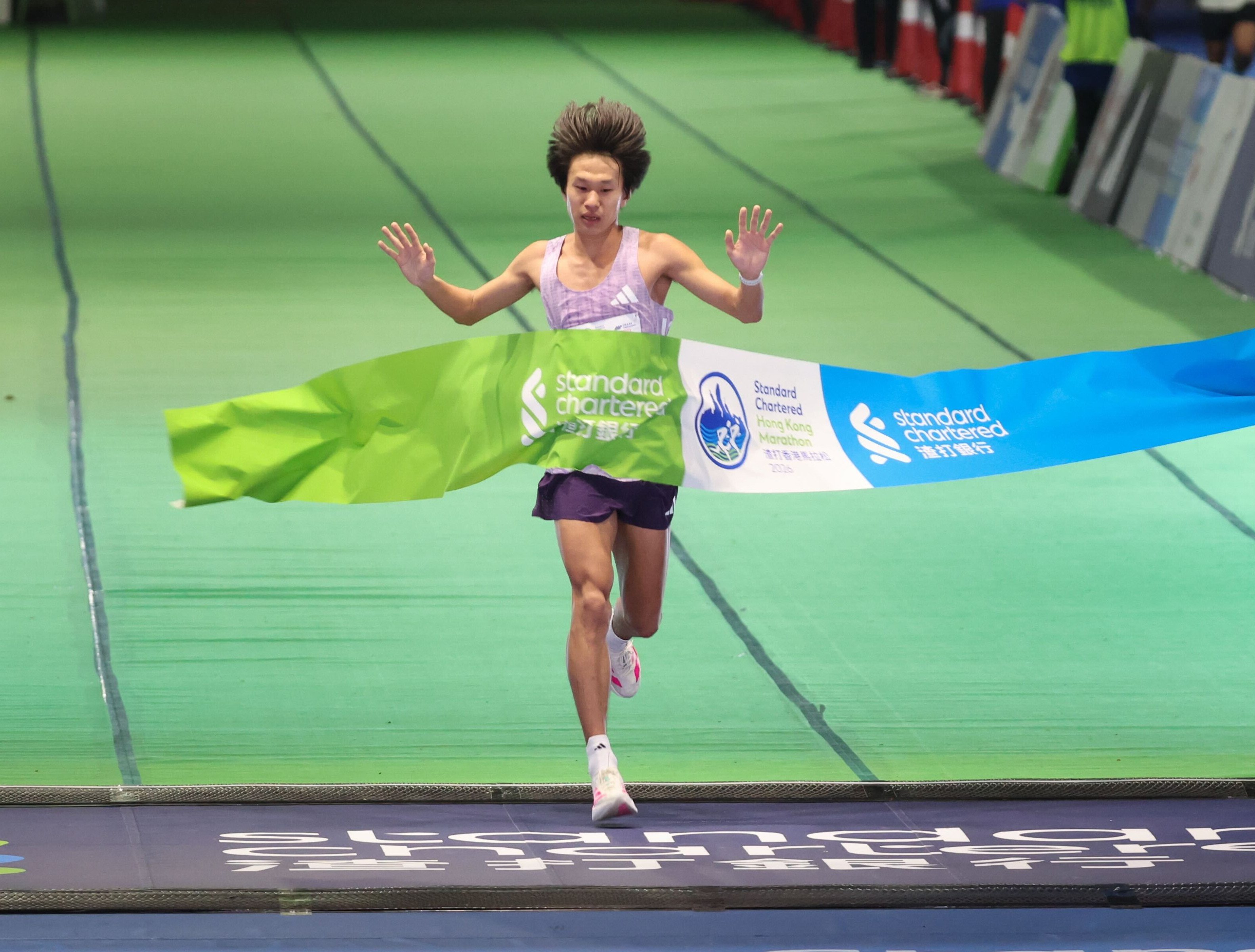 China’s Chen Yufan wins the men’s half-marathon. Photo: Dickson Lee