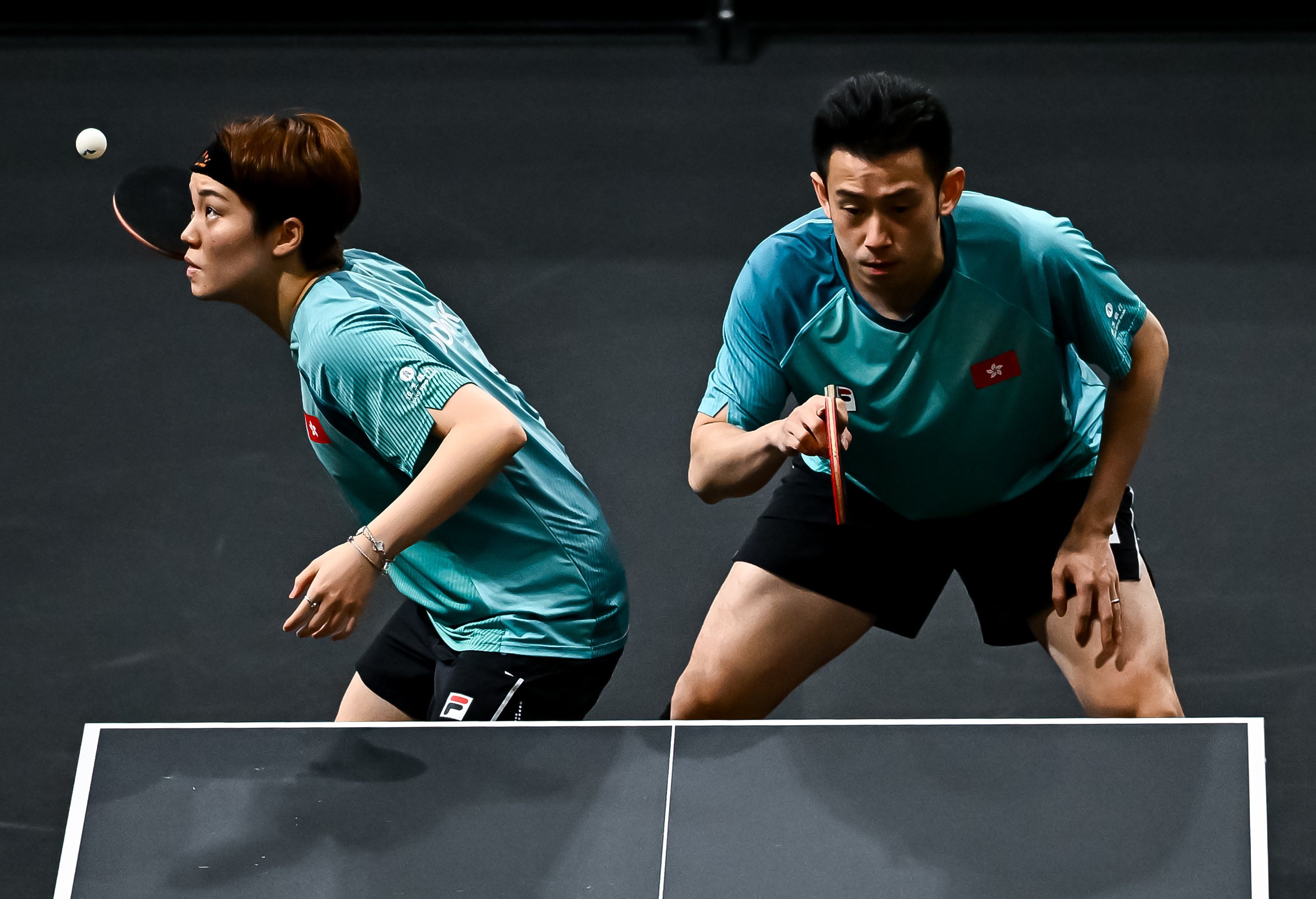 Hong Kong’s Doo Hoi-kem (left) and Wong Chun-ting finally got their hands on a WTT trophy. Photo: Xinhua