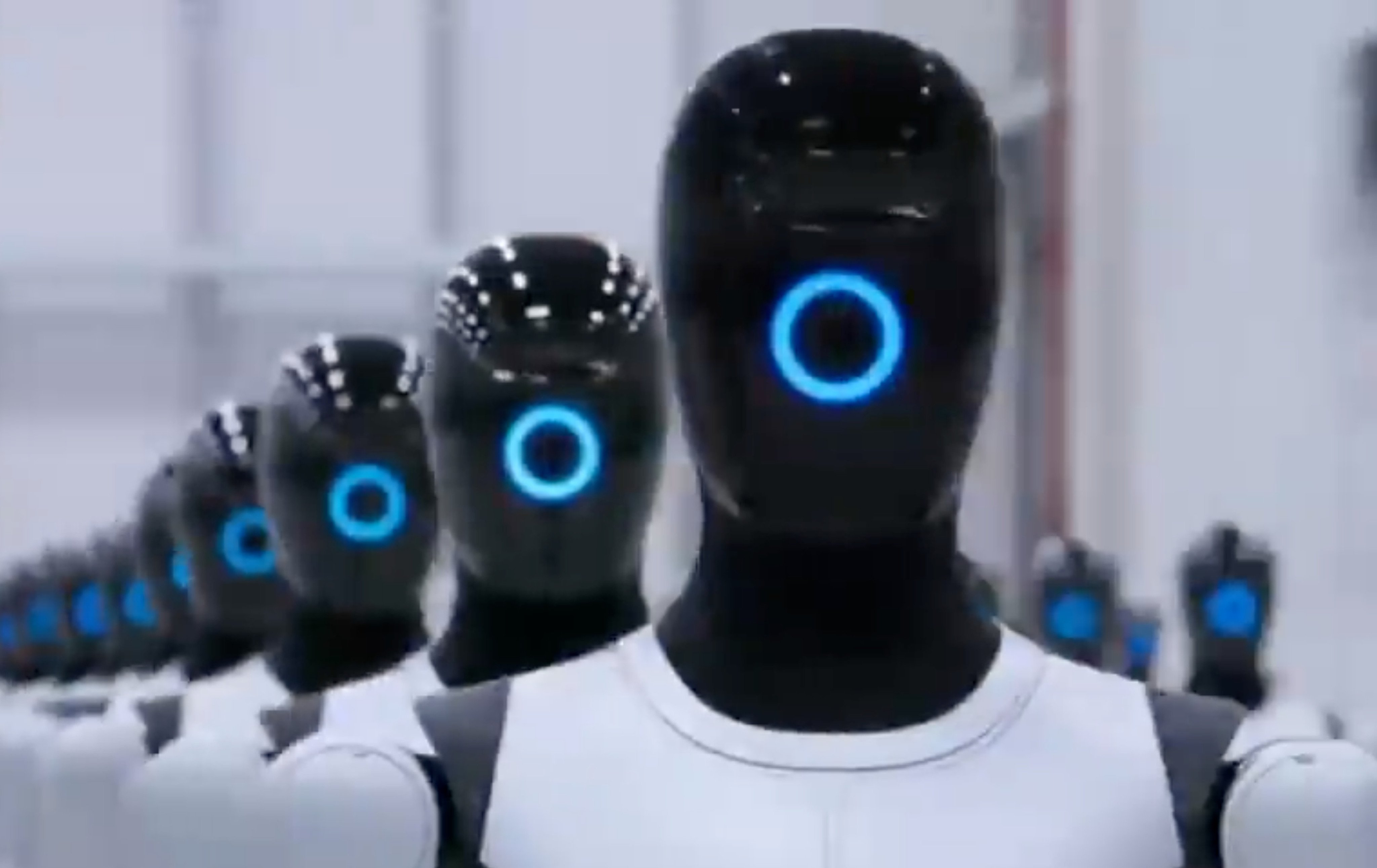 In this screengrab from video footage released by UBTech, hundreds of Walker S2 humanoid robots stand in precise formation inside a warehouse. Photo: Baidu