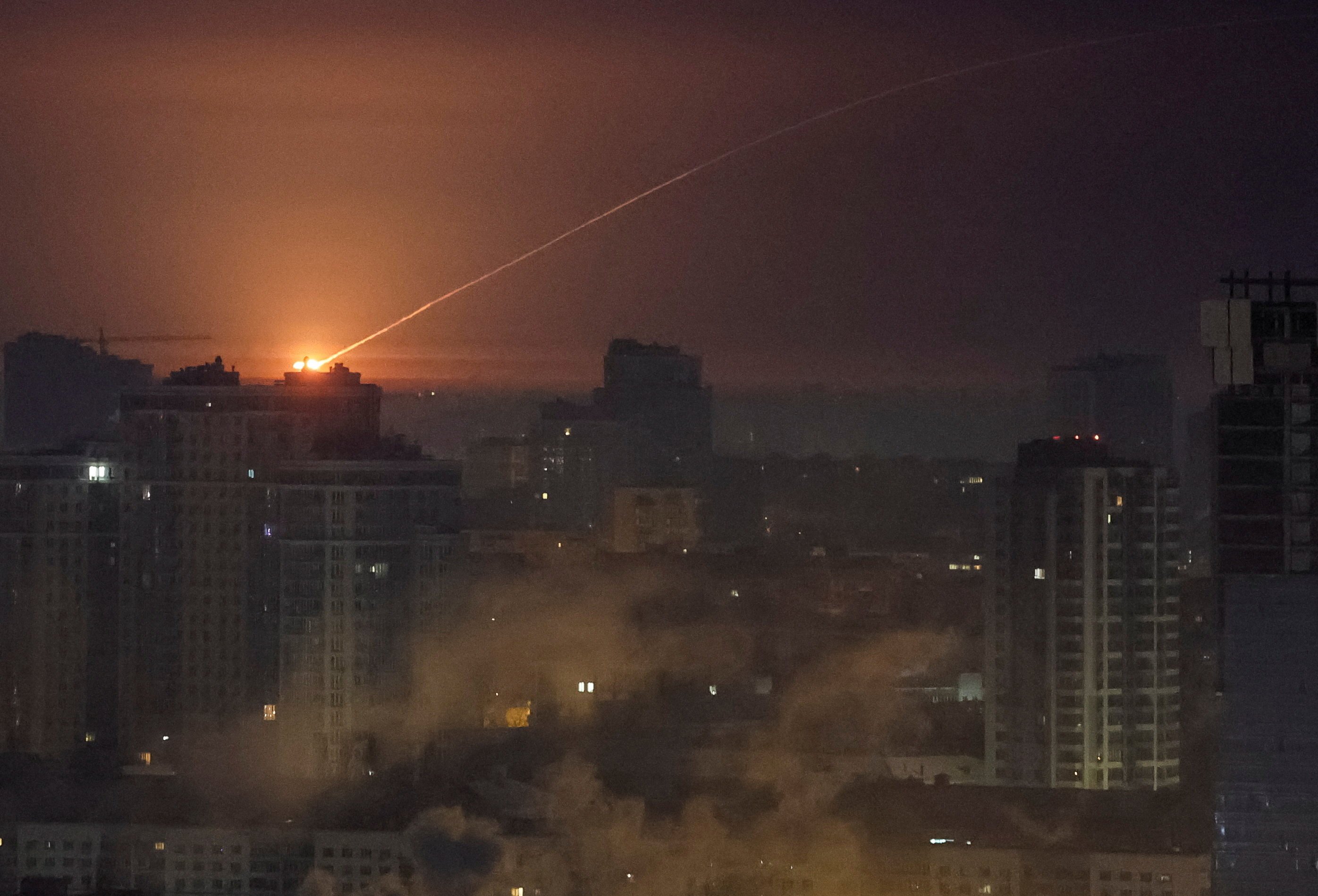 Ukrainian servicemen shoot down a missile during a Russian strike in Kyiv on Tuesday. Photo: Reuters