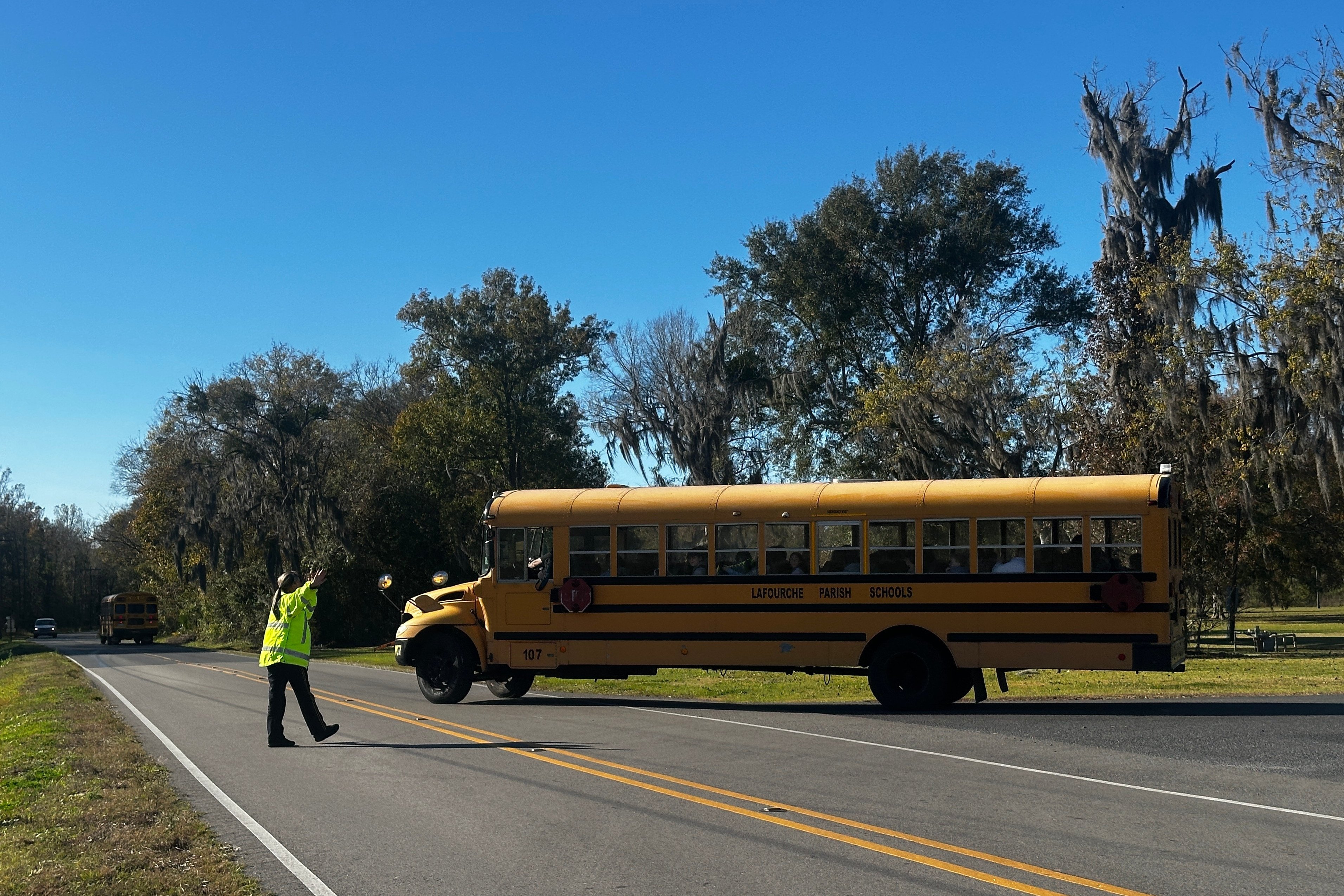 A school bus carries children at the end of a school day in the US state of Louisiana, where student victims of deepfake images are seeking justice. Photo: AP