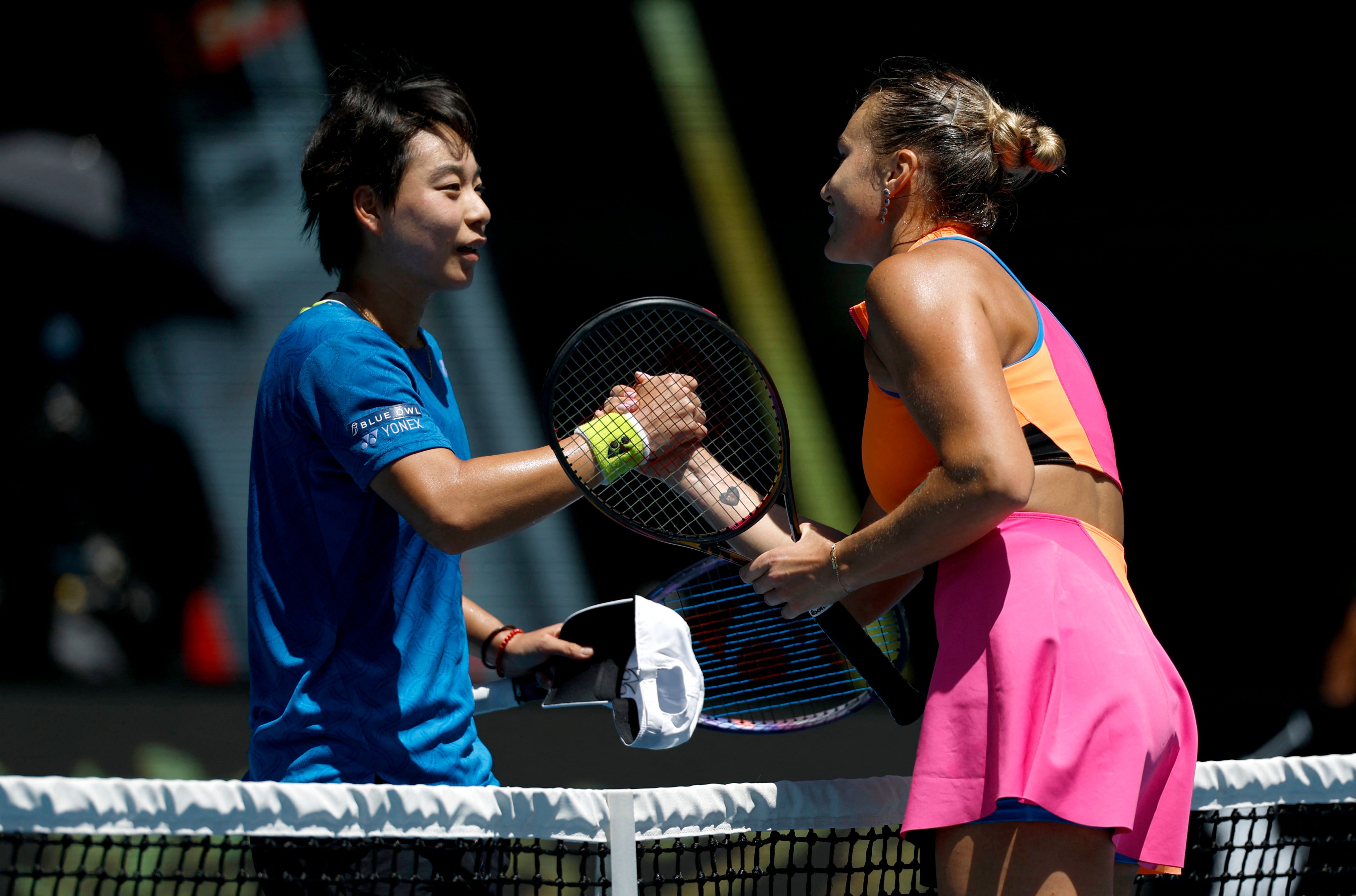 Belarus’ Aryna Sabalenka (right) shakes hands with China’s Bai Zhuoxuan after winning their  second-round match. Photo: Reuters