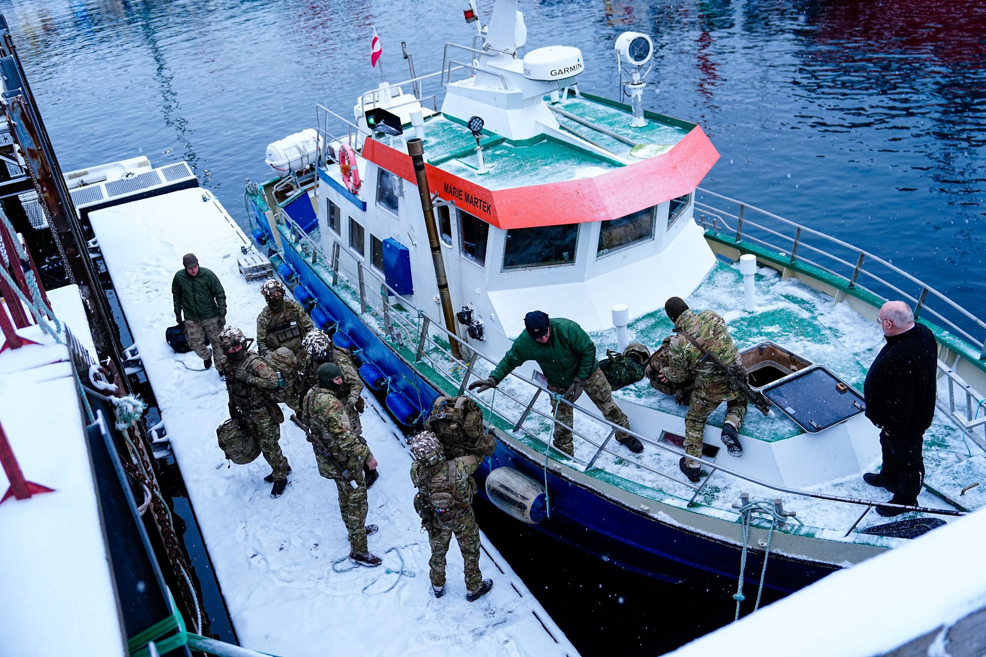 Danish soldiers disembark at the port in Nuuk, Greenland, on Sunday. Photo: EPA Danish soldiers disembark at the port in Nuuk, Greenland, on Sunday. Photo: EPA