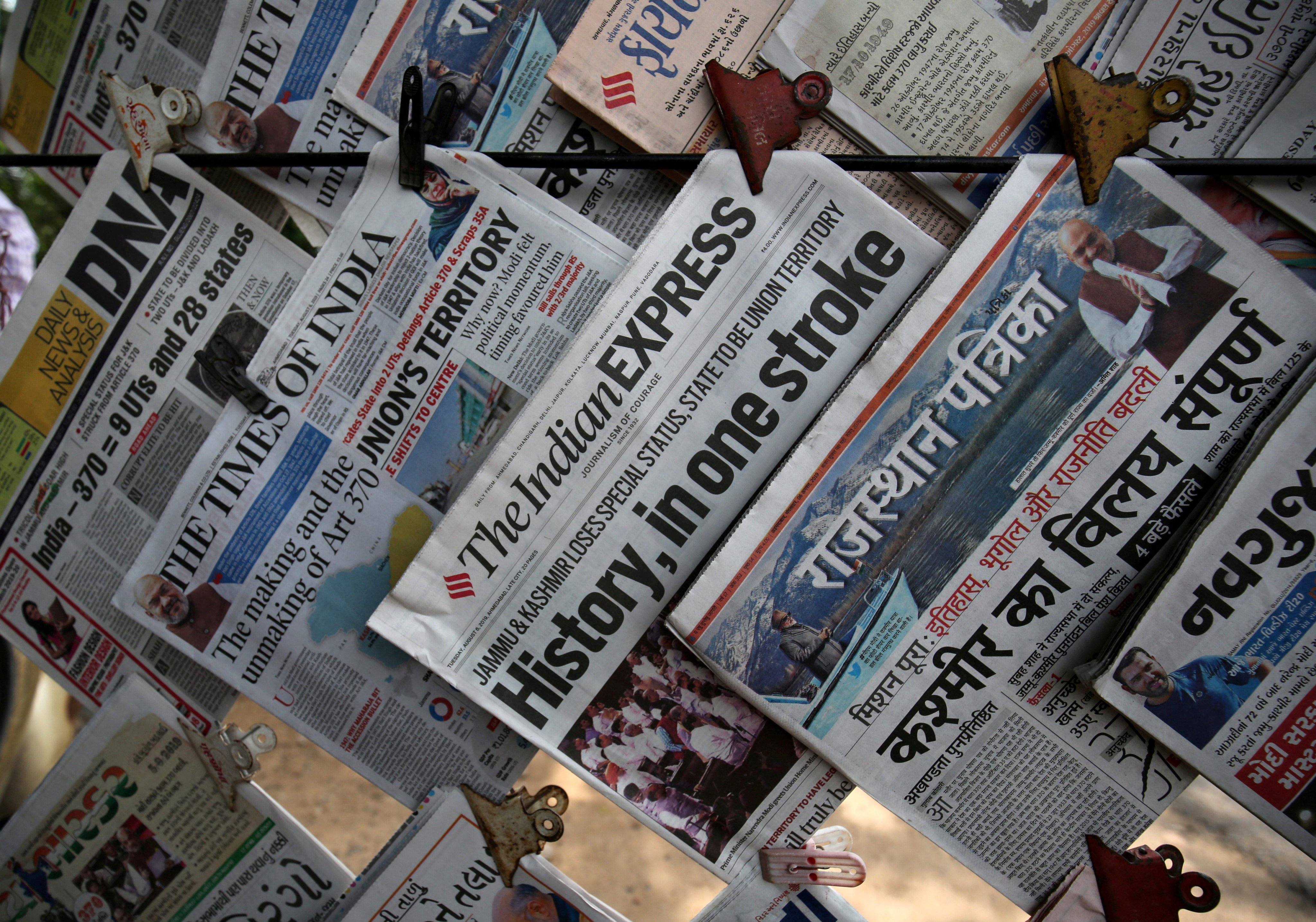 In August 2019, newspapers in Ahmedabad headline Kashmir’s lost special status, as local journalists face pressure to pledge not to ‘disturb peace’. Photo: Reuters