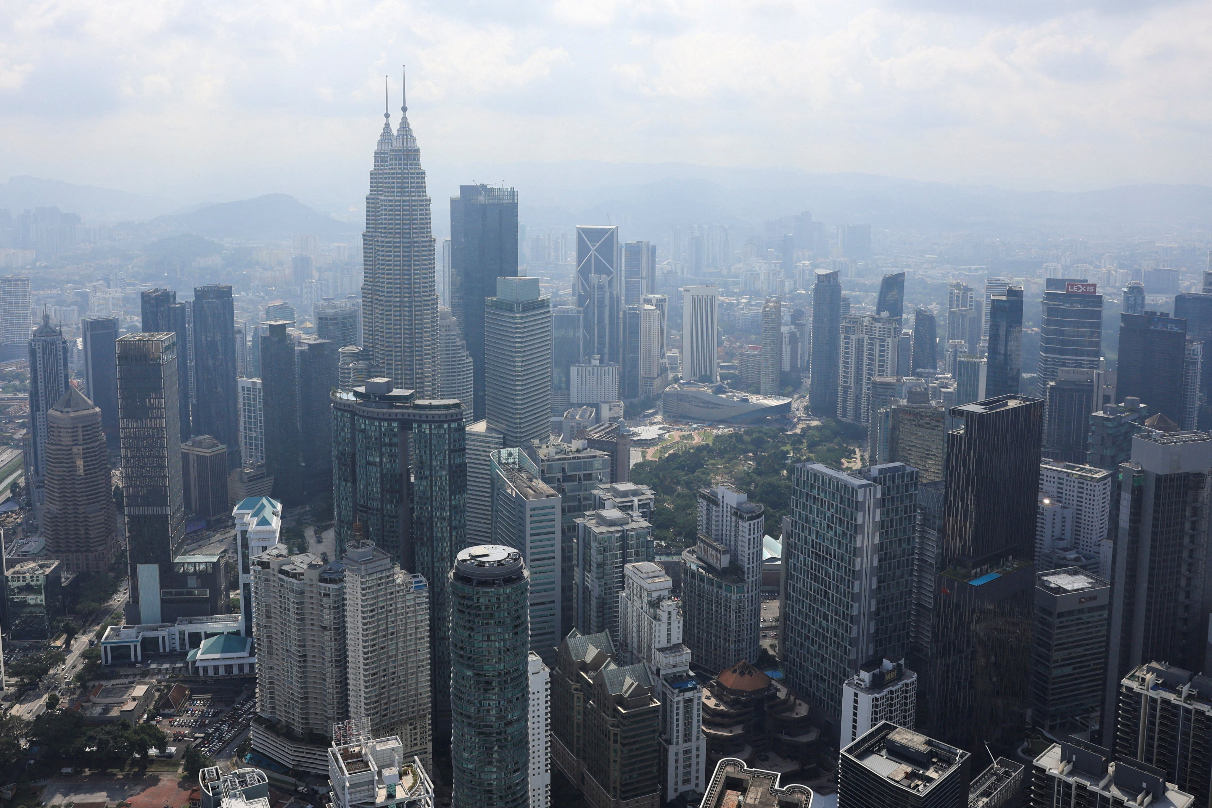 Kuala Lumpur’s skyline. Malaysia will double the minimum pay threshold for expatriate visas in June. Photo: Reuters