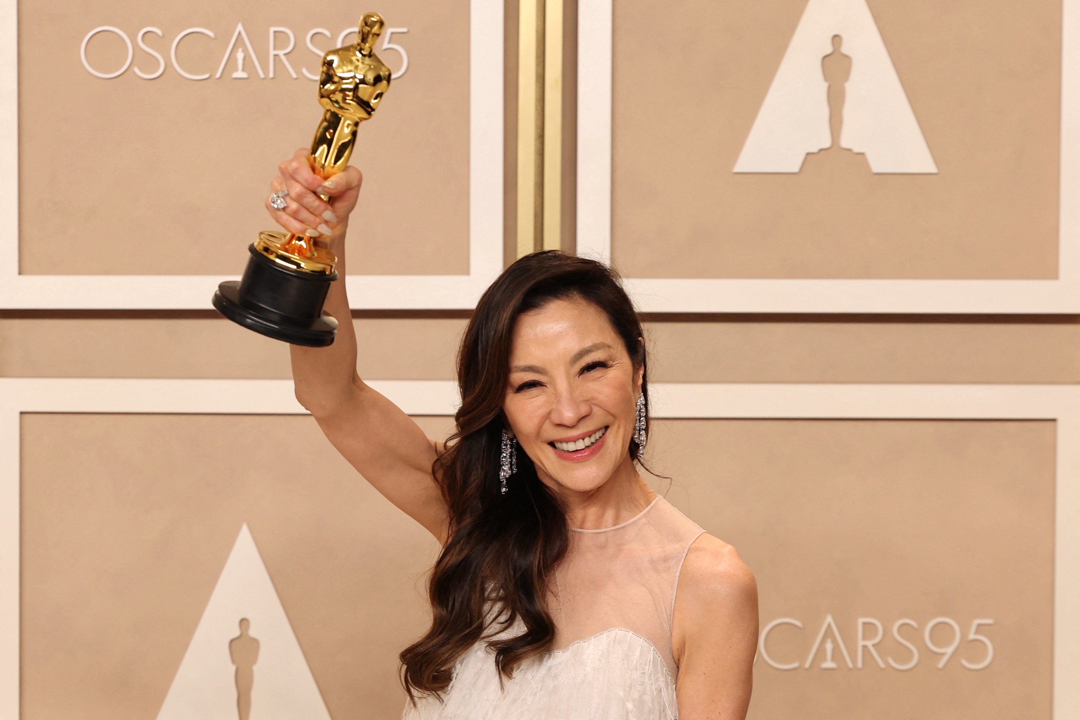 Michelle Yeoh poses with her Oscar at the 95th Academy Awards in Hollywood on March 12, 2023. Photo: Reuters