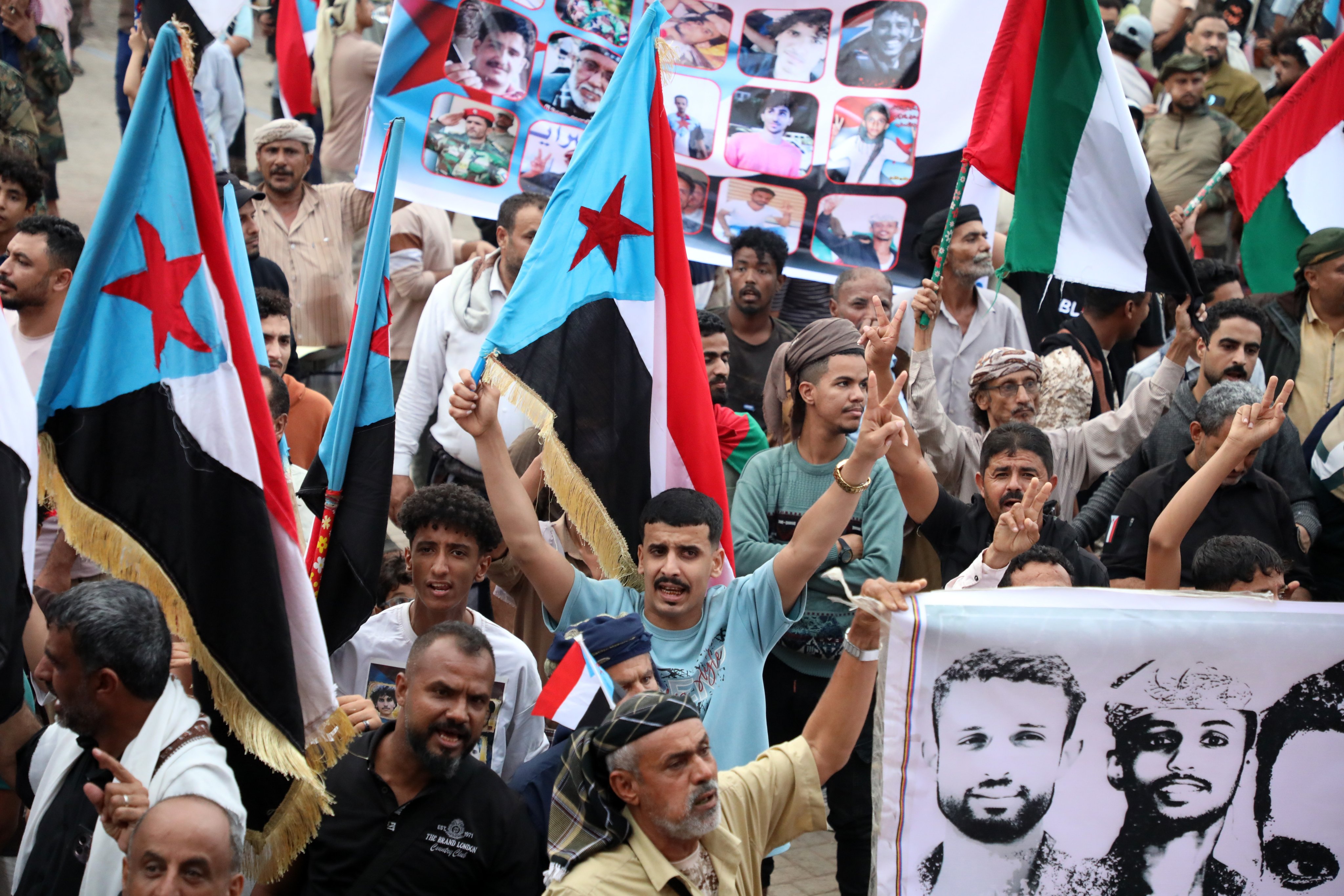Yemeni separatists wave South Yemen and UAE flags during a protest against Saudi Arabia in Aden on December 30. Photo: EPA