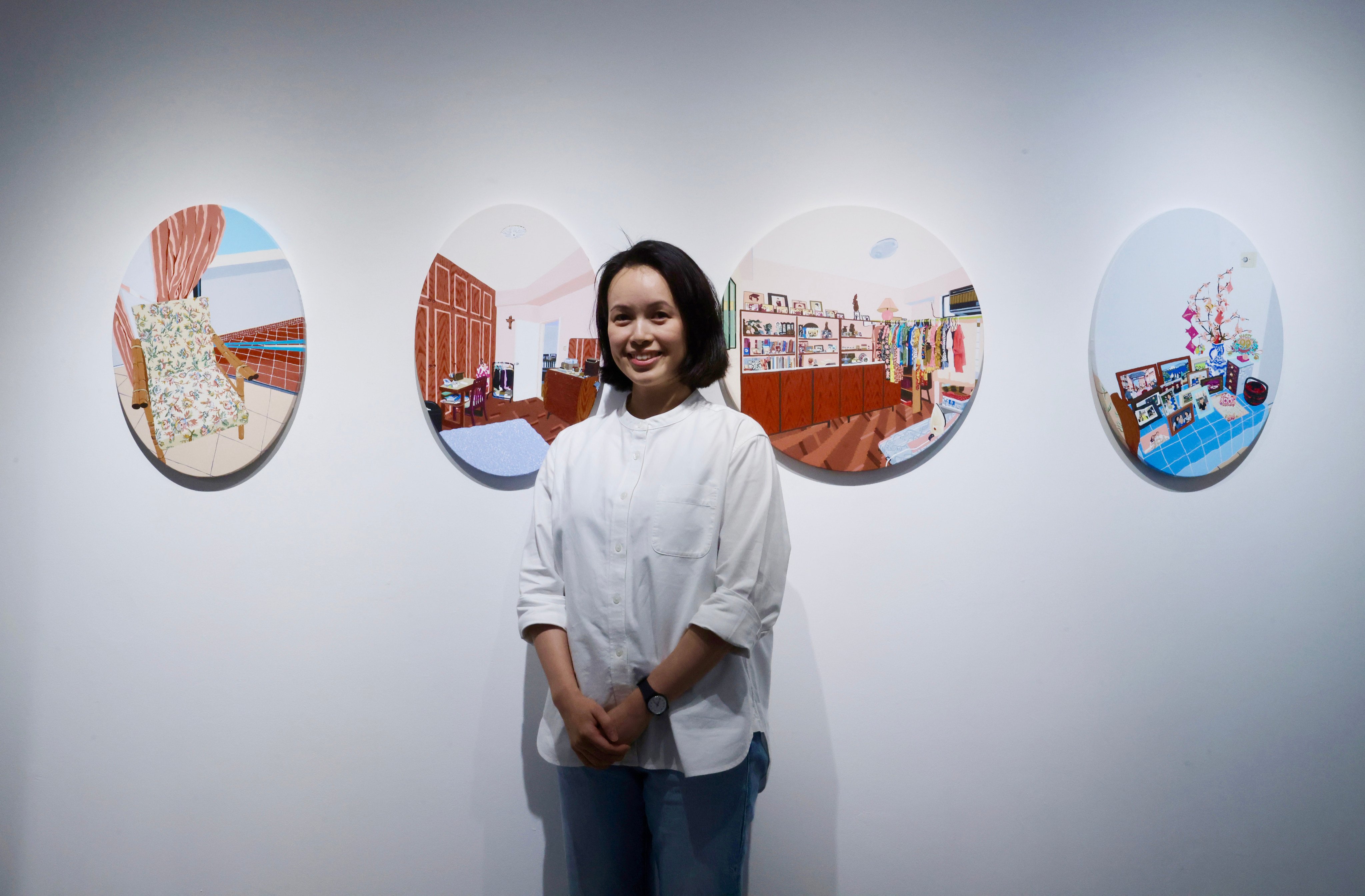 Artist Marian Ang stands in front of “All About My Grandmother” (2025) at her “No Man’s Land” exhibition at Hart Haus, in Kennedy Town, Hong Kong. The title of her solo exhibition reflects how she feels about motherhood. Photo: Jonathan Wong