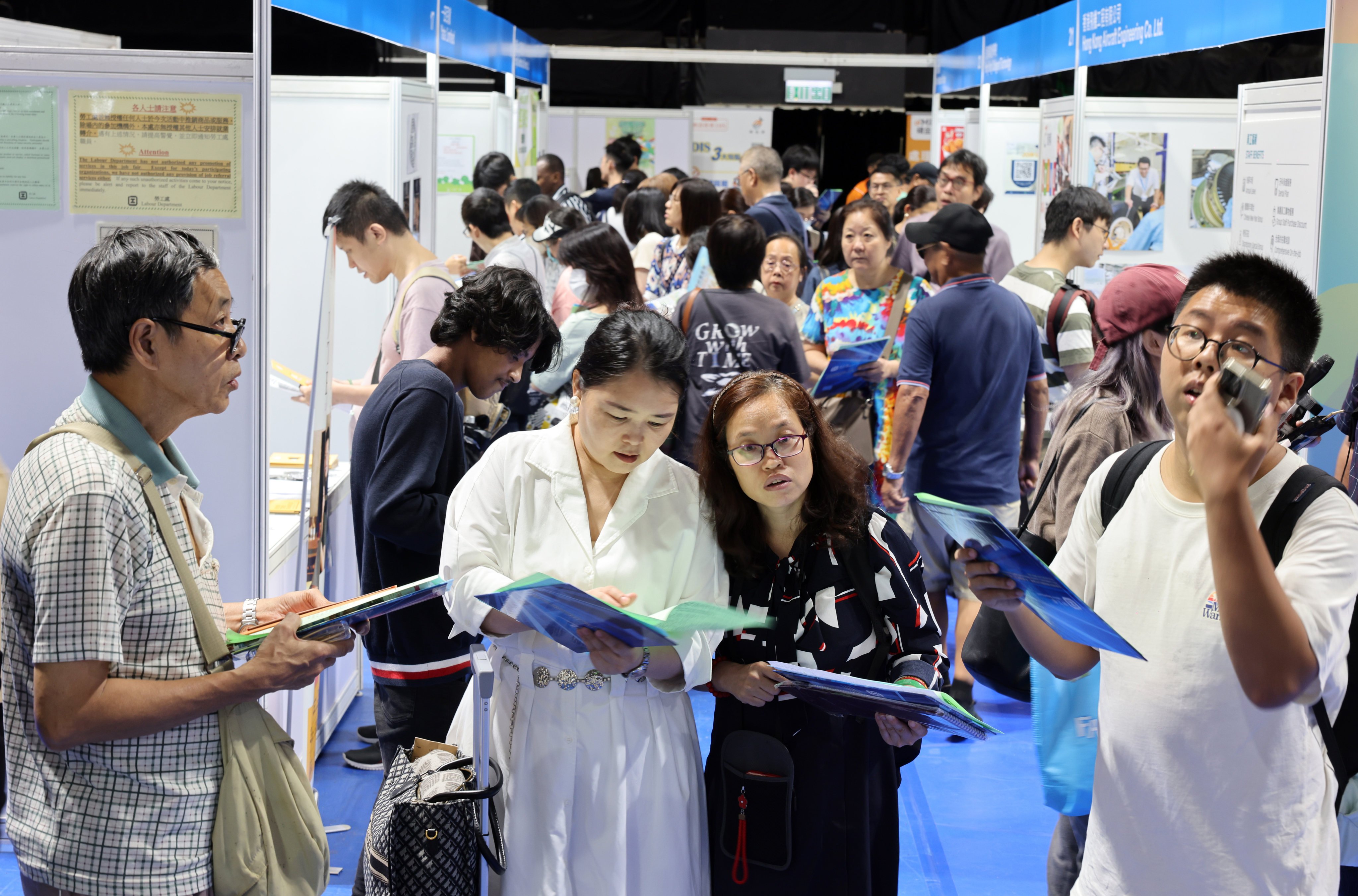 People attend the Building a Multicultural Workplace Job Fair at MacPherson Stadium in Mong Kok on July 24. Photo: Nora Tam