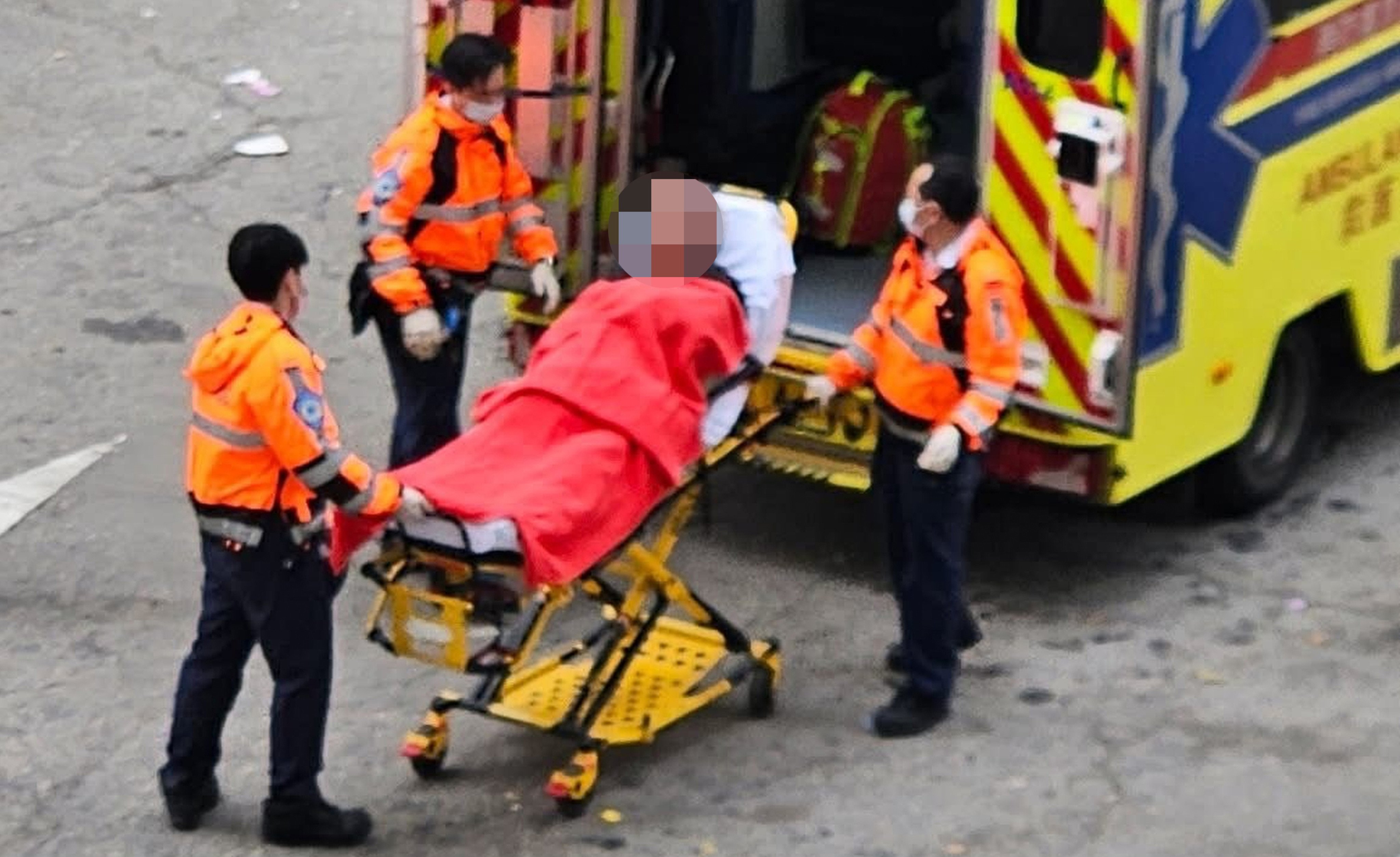 Medical staff rush to send an injured person to hospital following the attack. Photo: Handout