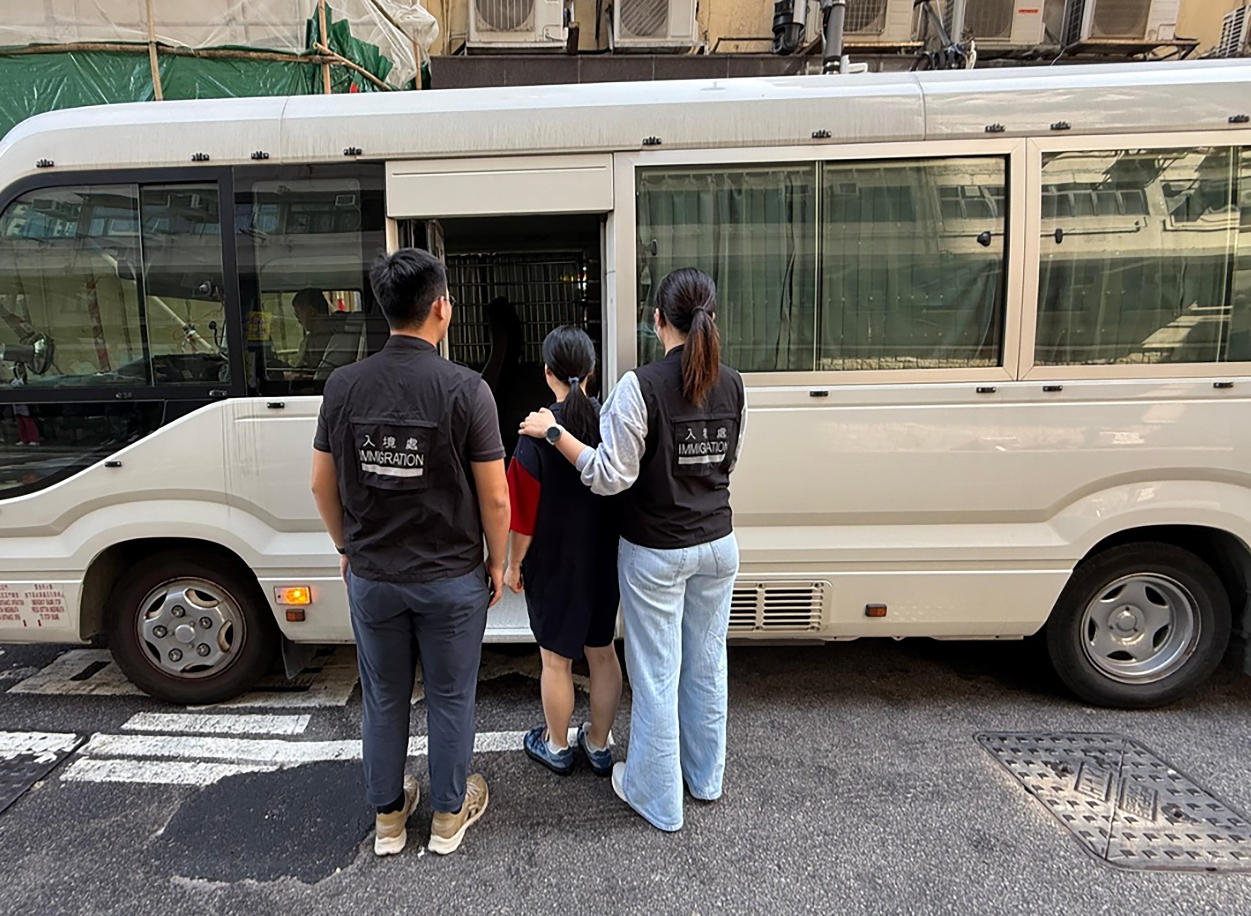 Authorities escort some of the suspects caught in the recent crackdown. Photo: Handout