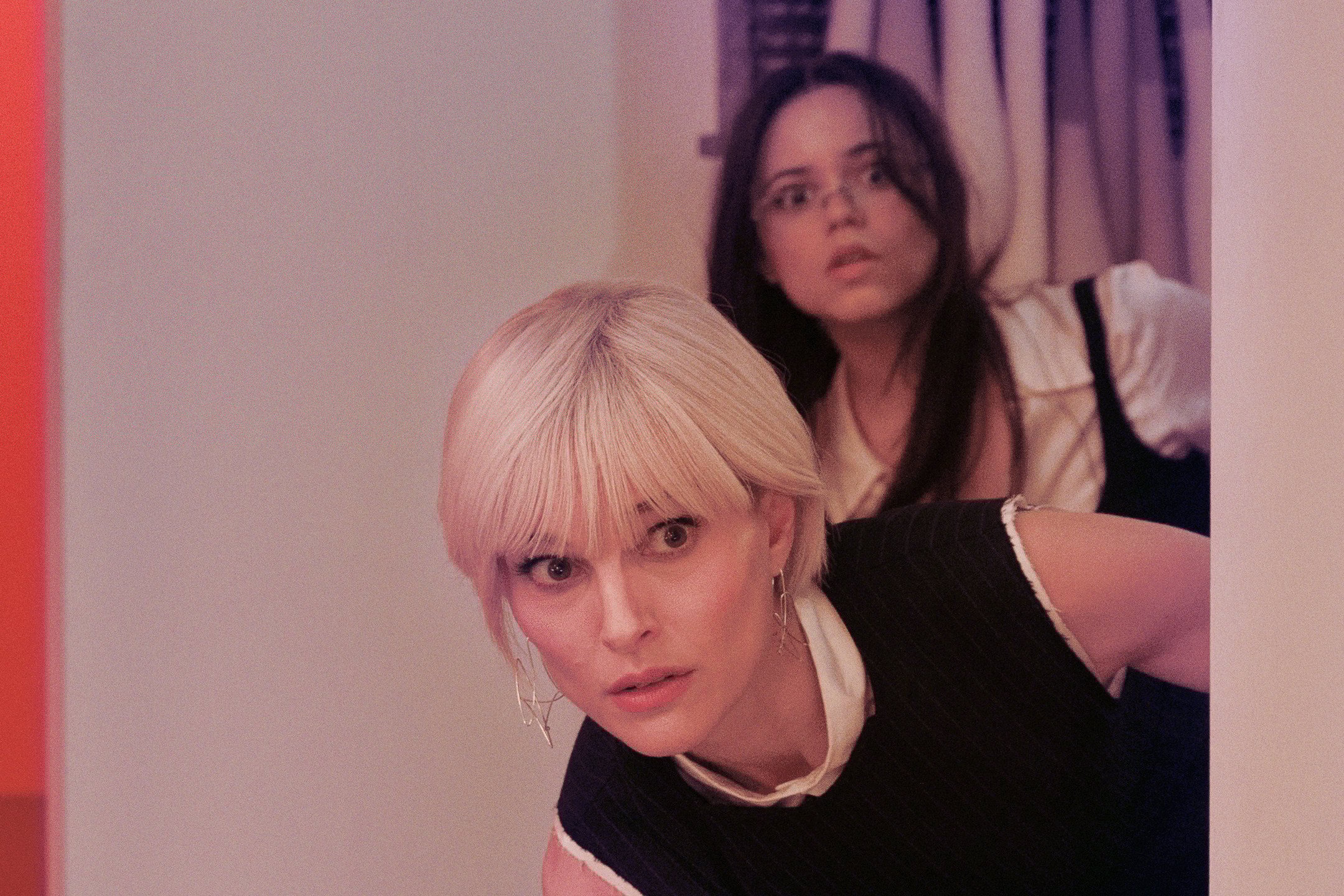 Natalie Portman, foreground, and Jenna Ortega appear in a scene from “The Gallerist,” an official selection of the 2026 Sundance Film Festival. (MRC II Distribution Company L.P./Sundance Institute via AP)