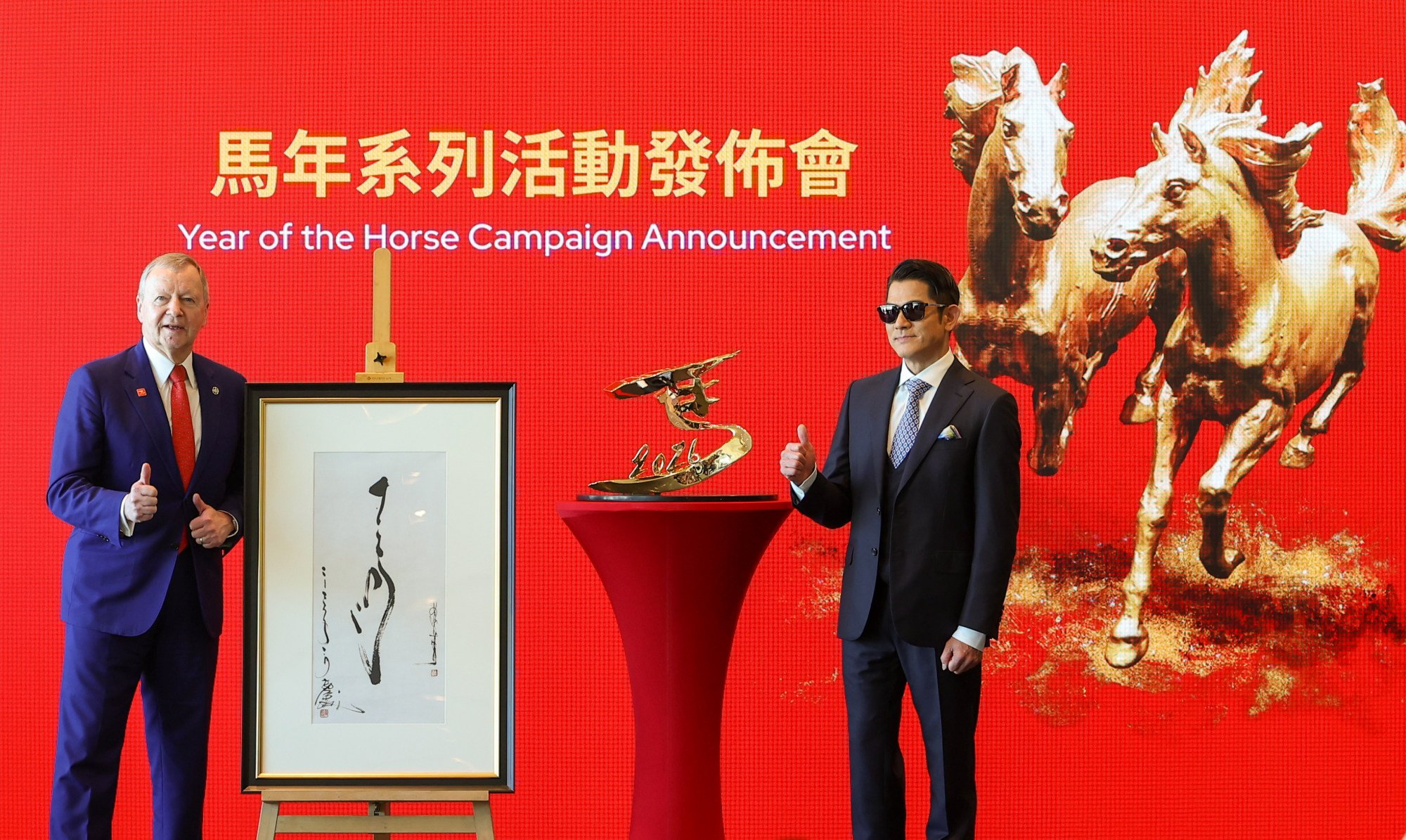 Jockey Club chief executive Winfried Engelbrecht-Bresges and singer Aaron Kwok Fu-shing at the Year of the Horse campaign announcement. Photo: Edmond So Jockey Club chief executive Winfried Engelbrecht-Bresges and singer Aaron Kwok Fu-shing at the Year of the Horse campaign announcement. Photo: Edmond So