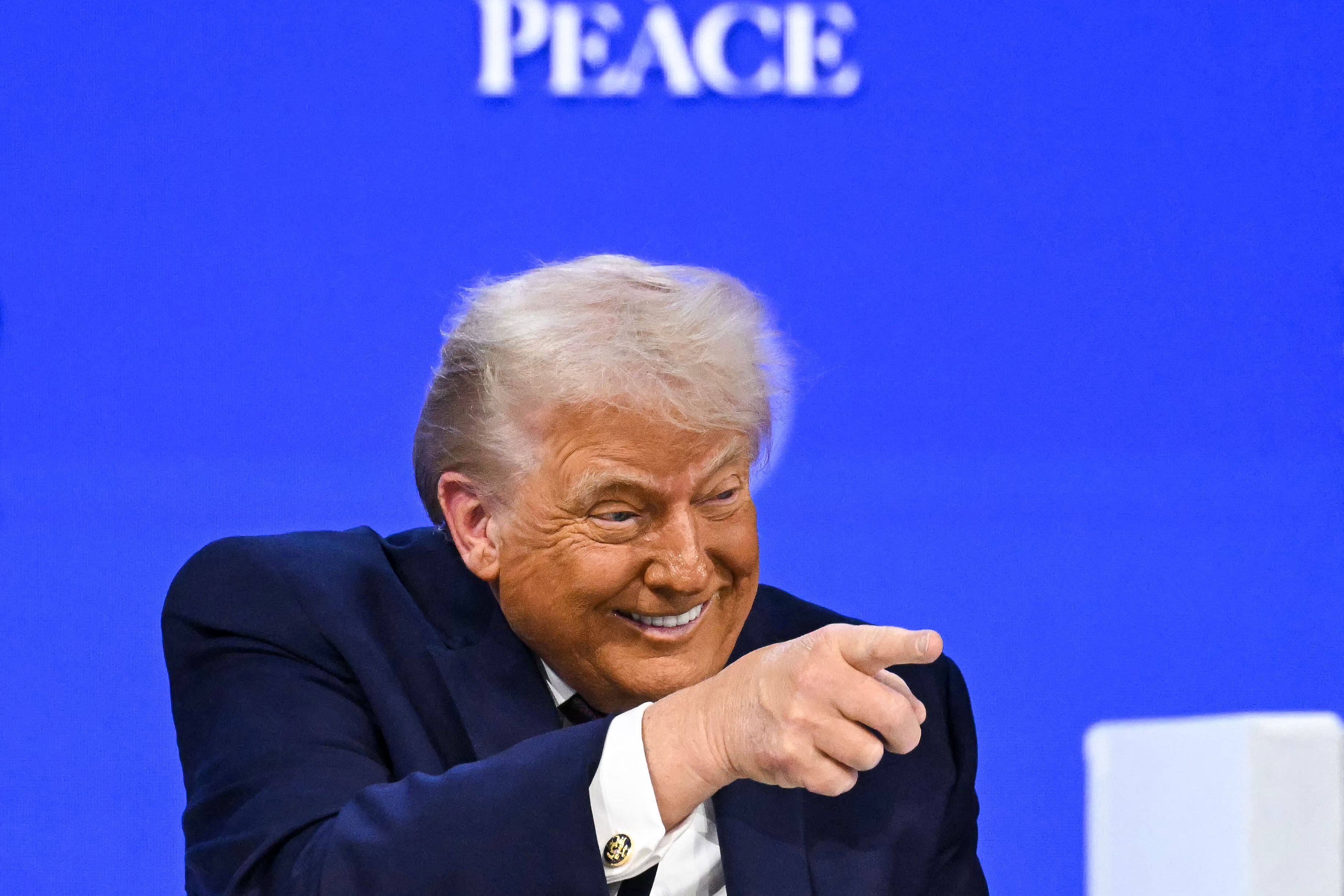 US President Donald Trump gestures as he speaks at the “Board of Peace” meeting during the World Economic Forum in Davos on Thursday. Photo: AFP