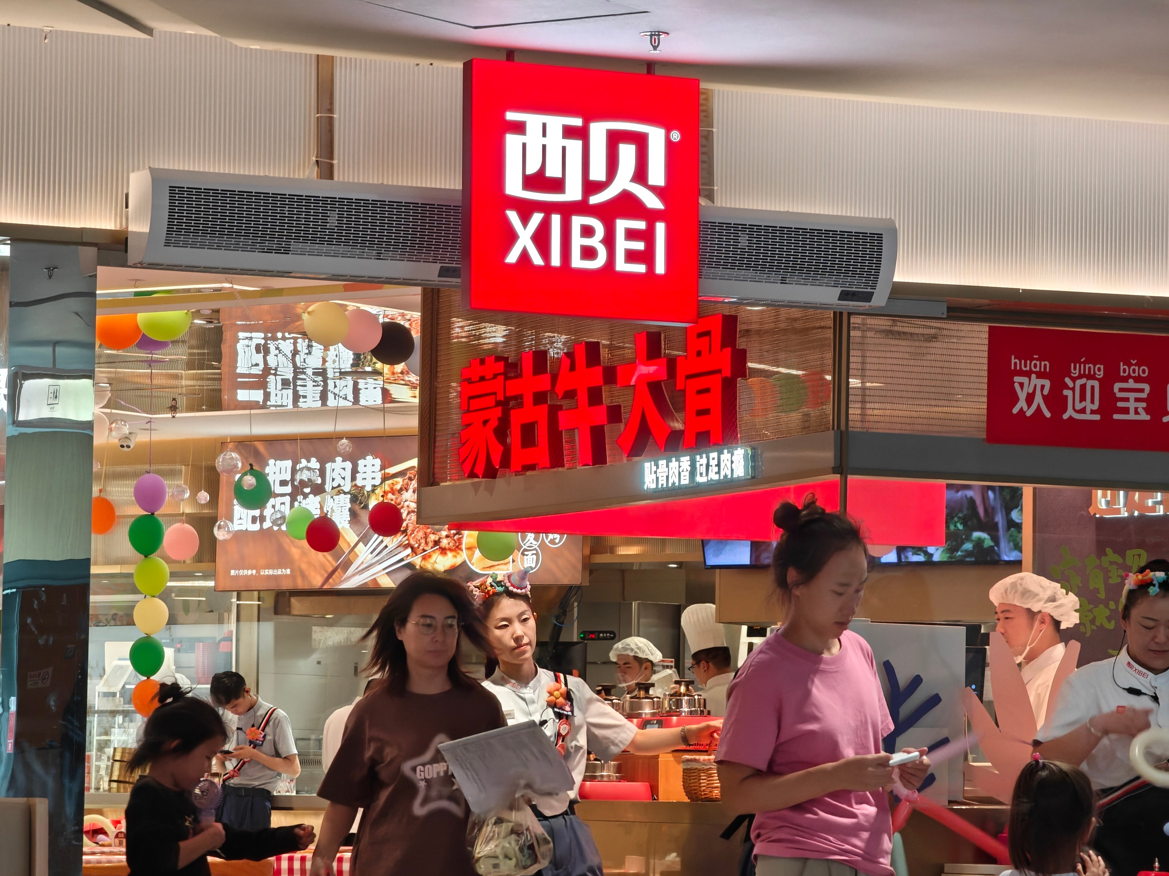 The controversy involves the Chinese restaurant chain Xibei, which became the target of an influencer’s online complaints about high-priced pre-made dishes. Photo: VCG via Getty Images