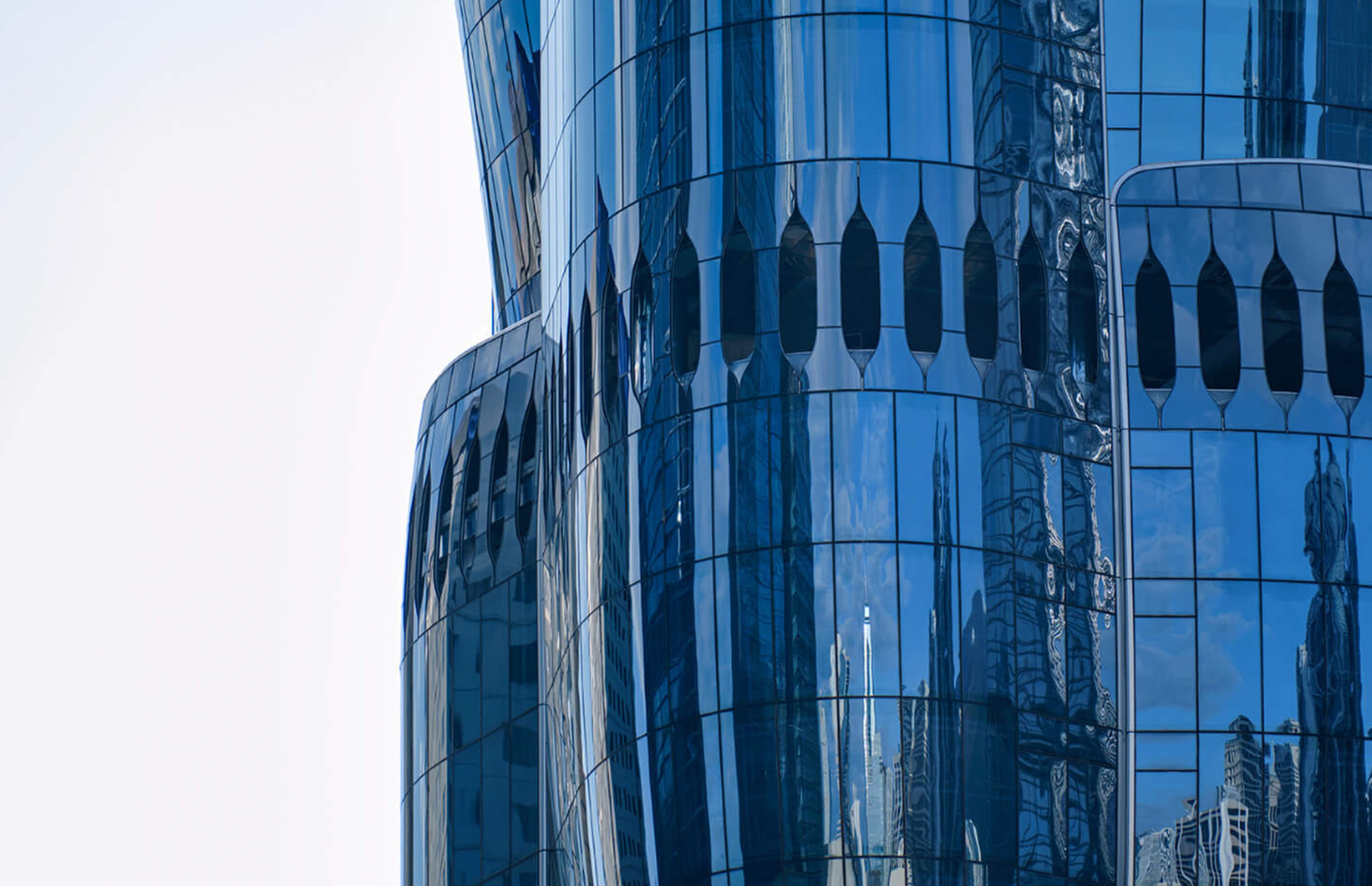 A view of The Henderson’s curved glass facade. Photo: Handout