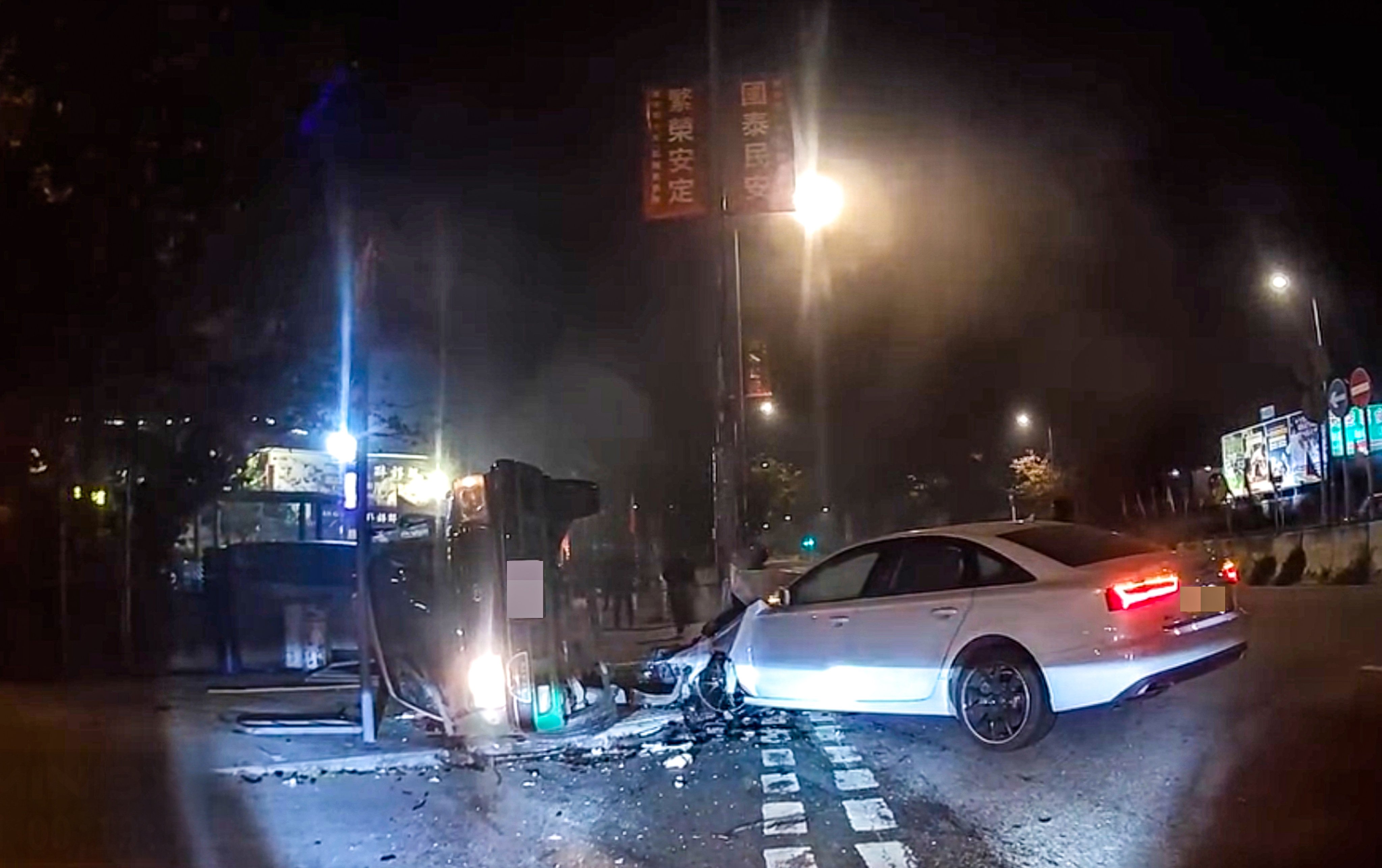 The taxi crashed into a private car and overturned. Photo: handout