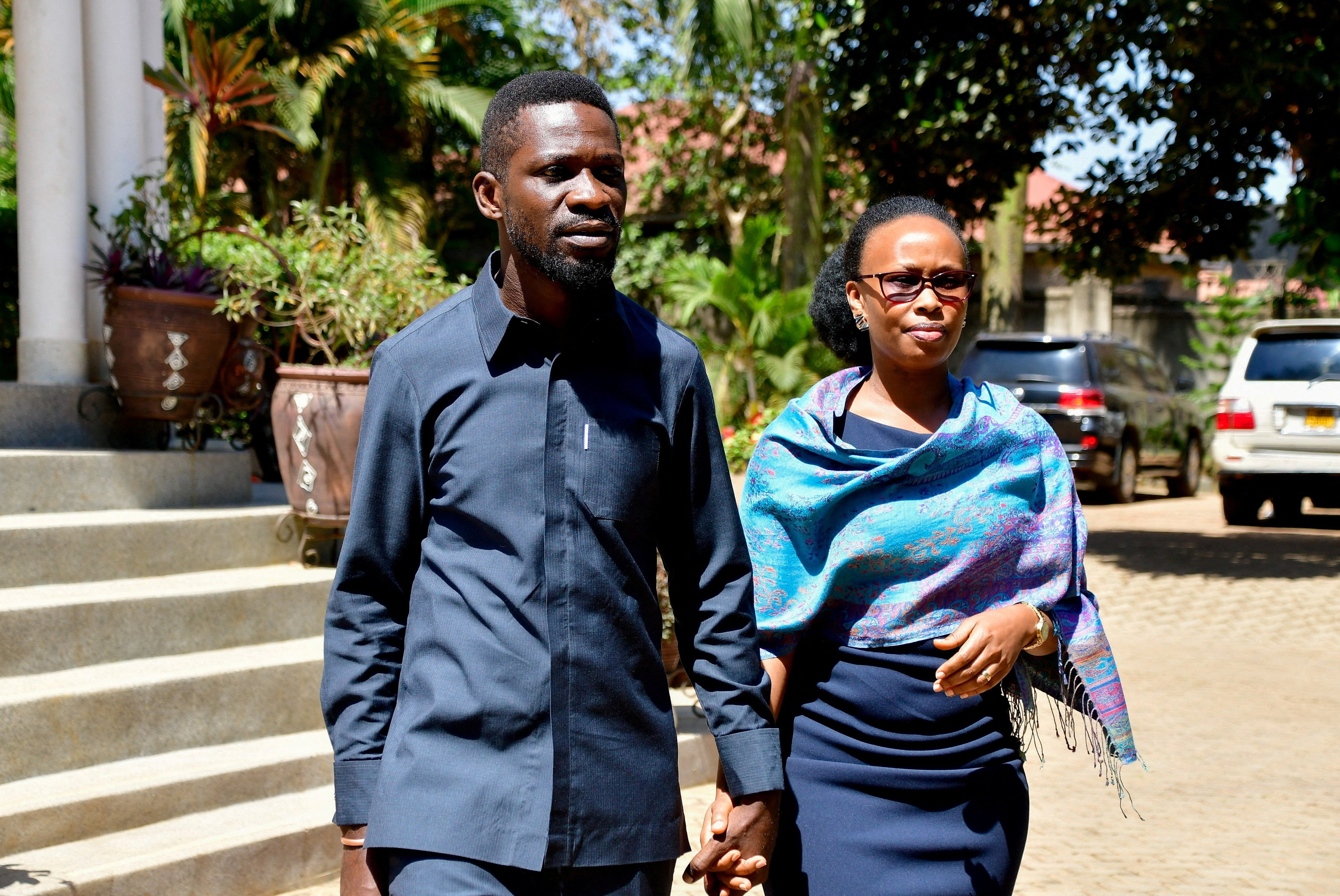 Robert Kyagulanyi, also known as Bobi Wine, walks with his wife Barbara near Kampala, Uganda, on the day of the general election earlier this month. Photo: Reuters